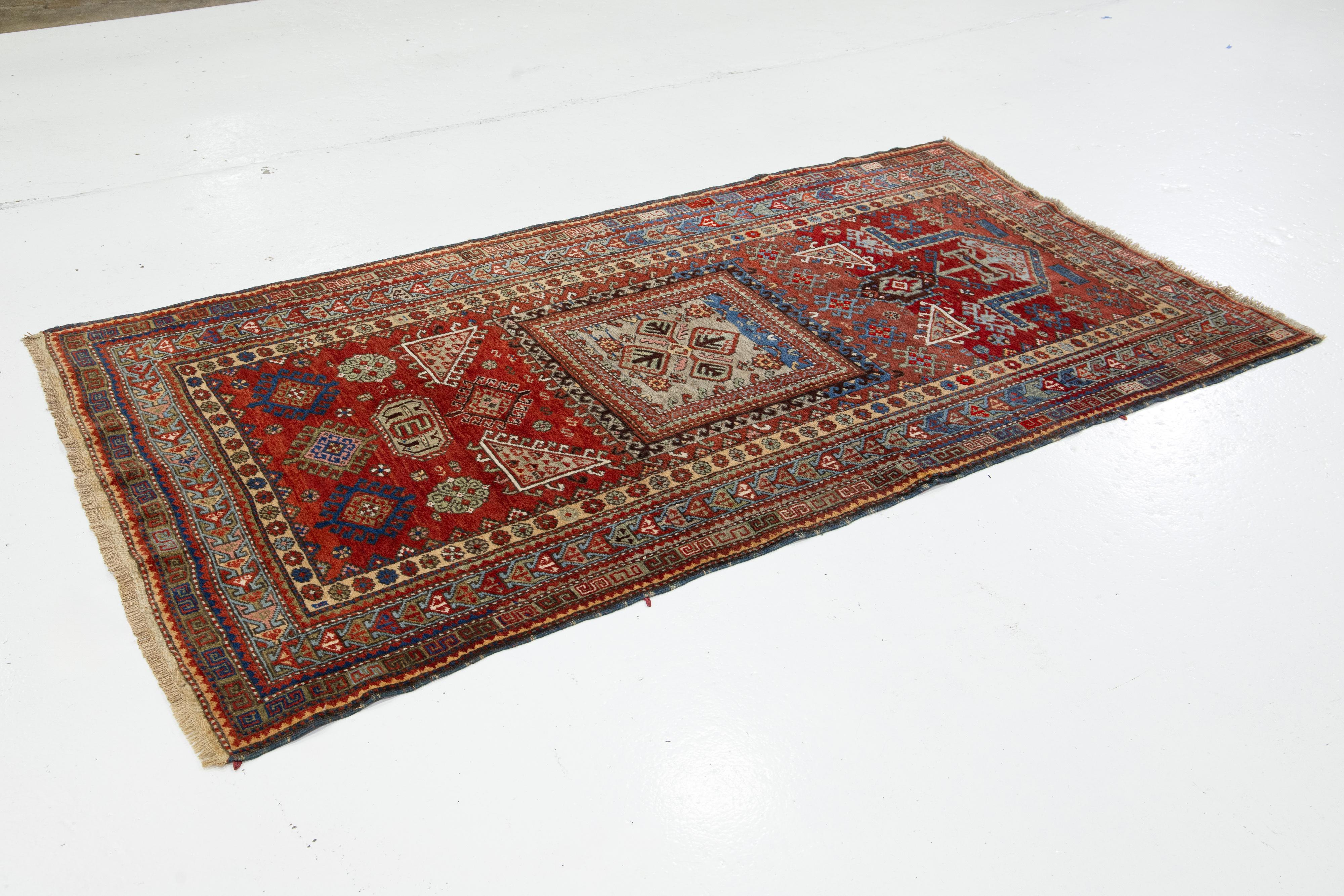 Hand-Knotted Red Vintage Caucasian Kazak Wool Rug With Geometric Pattern For Sale
