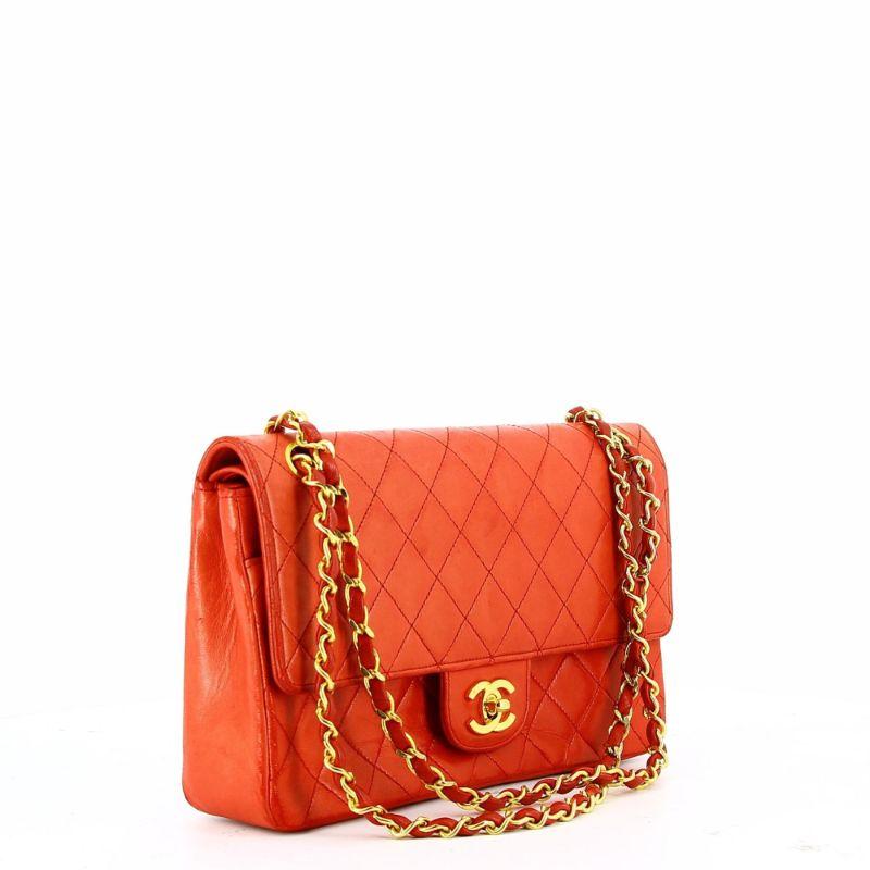 Chanel red timeless

Good condition show some signs of use and wear and some discoloration 