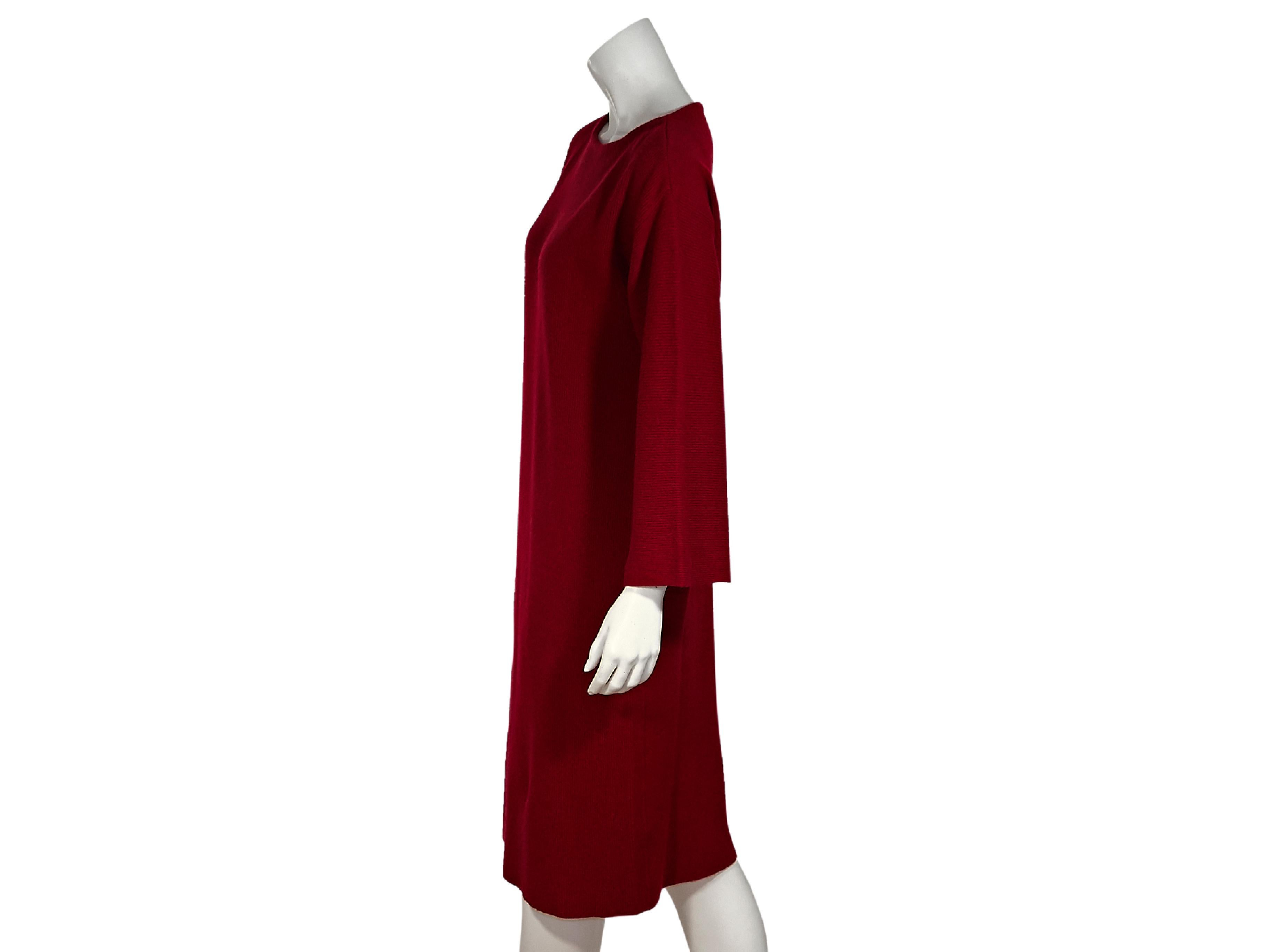 Product details:  Vintage red ribbed cashmere maxi dress by Givenchy.  Wide roundneck.  Three-quarter length sleeves.  Pullover style.  39