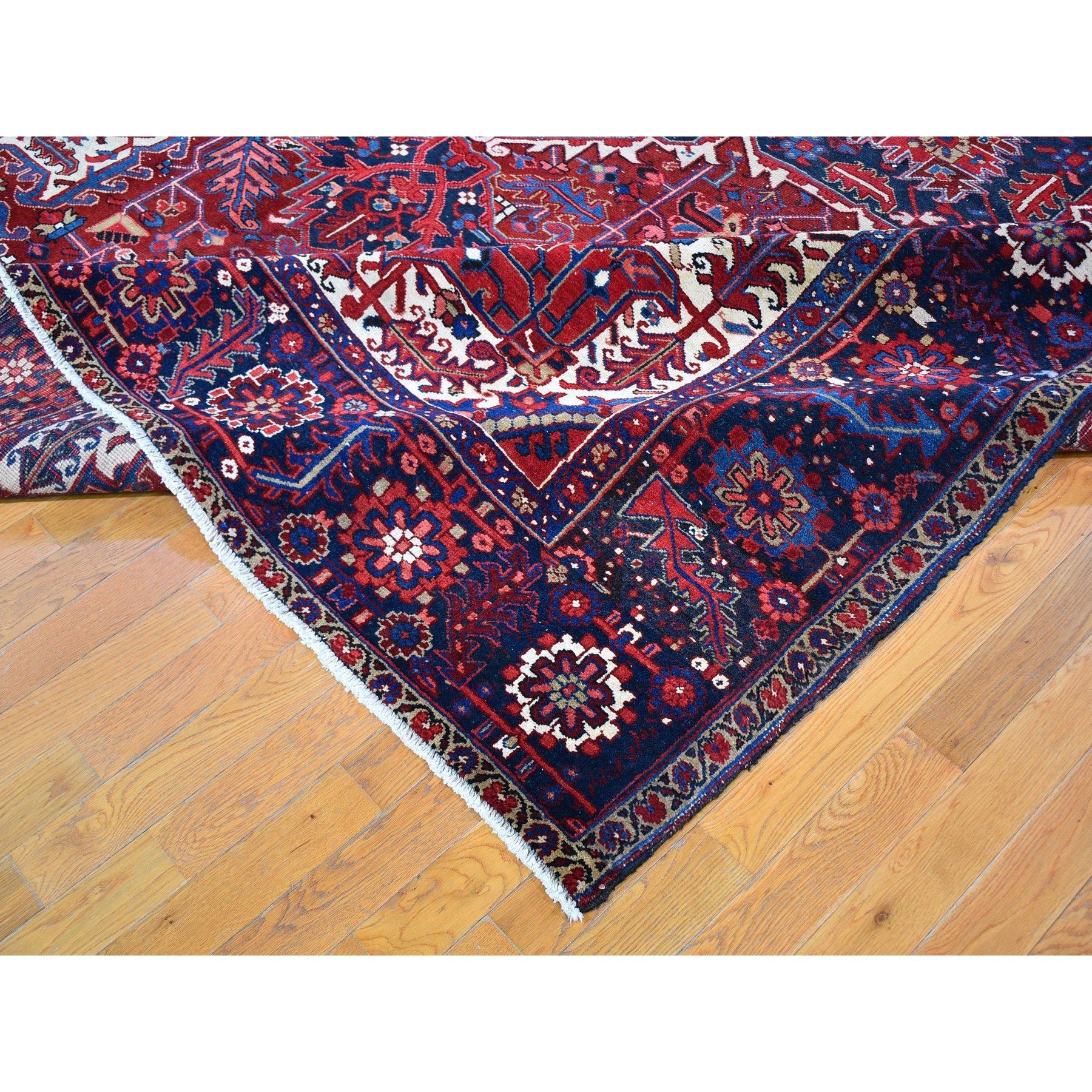Mid-20th Century Red Vintage Oversized Persian Heriz Slight Wear Hand Knotted Wool Rug