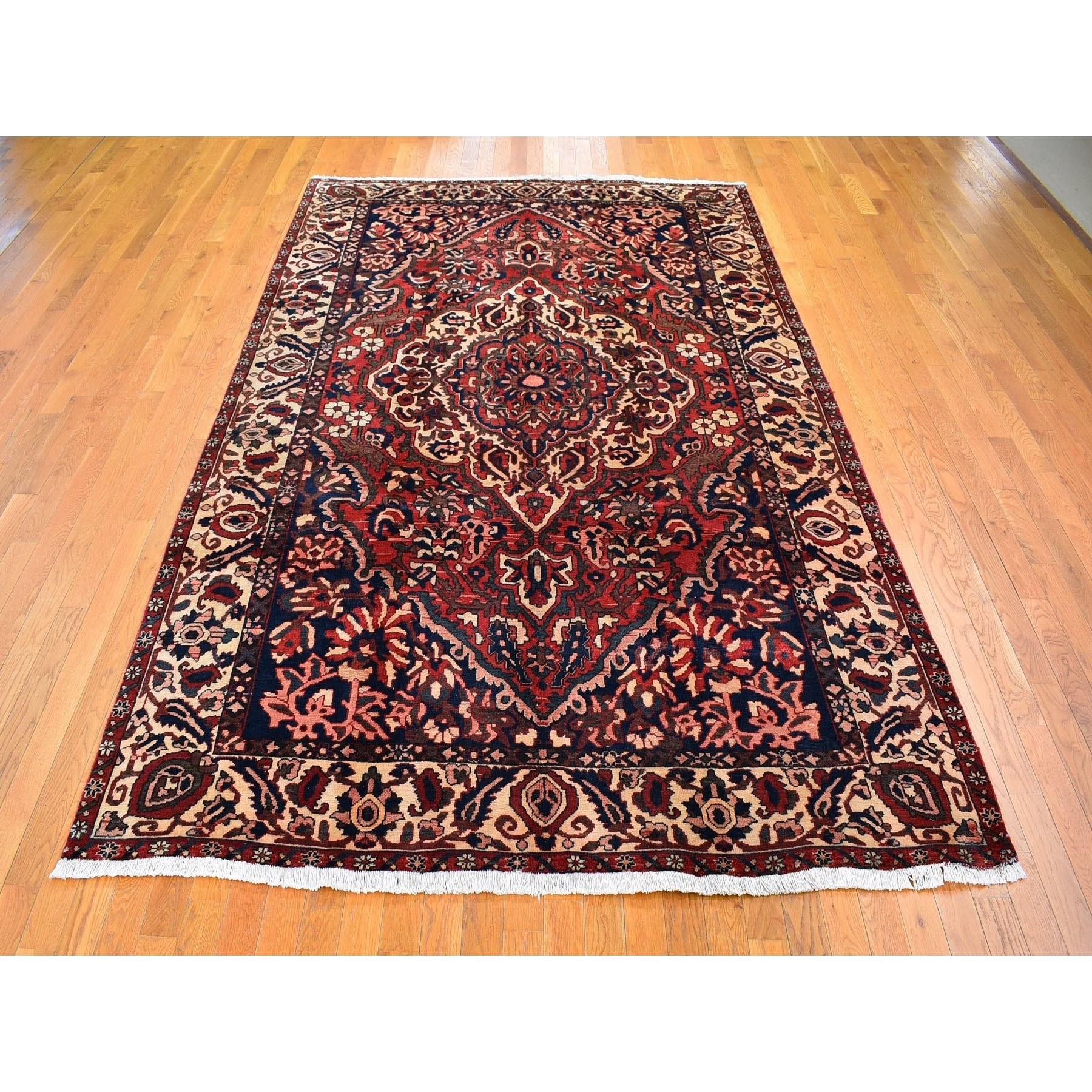 Medieval Red Vintage Persian Bakhtiar Good Condition Abrash Pure Wool Hand Knotted Rug For Sale