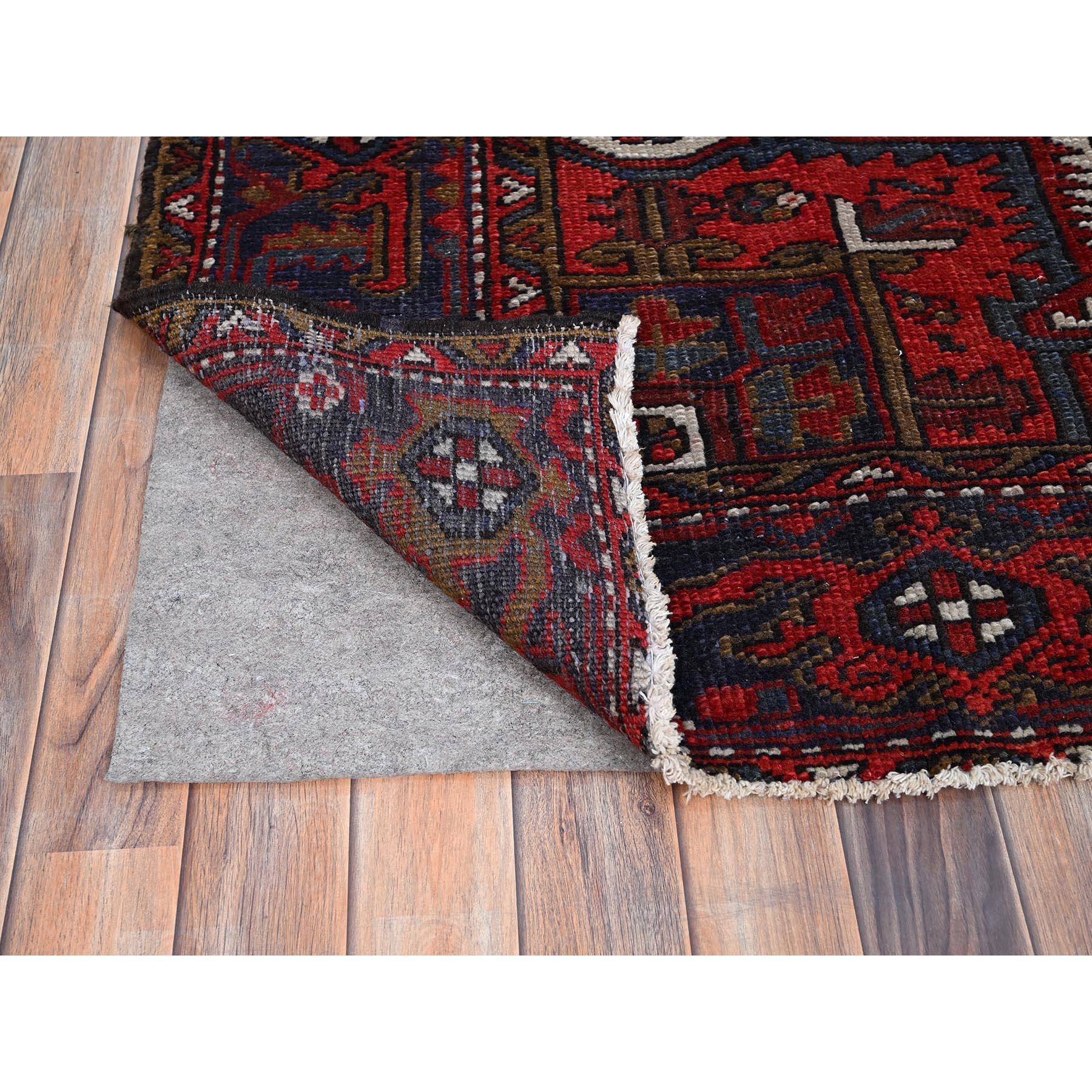 Mid-20th Century Red Vintage Persian Heriz Design Abrash Geometric Pattern Wool Hand Knotted Rug For Sale