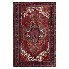 Tapis persan Heriz vintage rouge, tribal, en pure laine nouée à la main, d'aspect rustique et propre