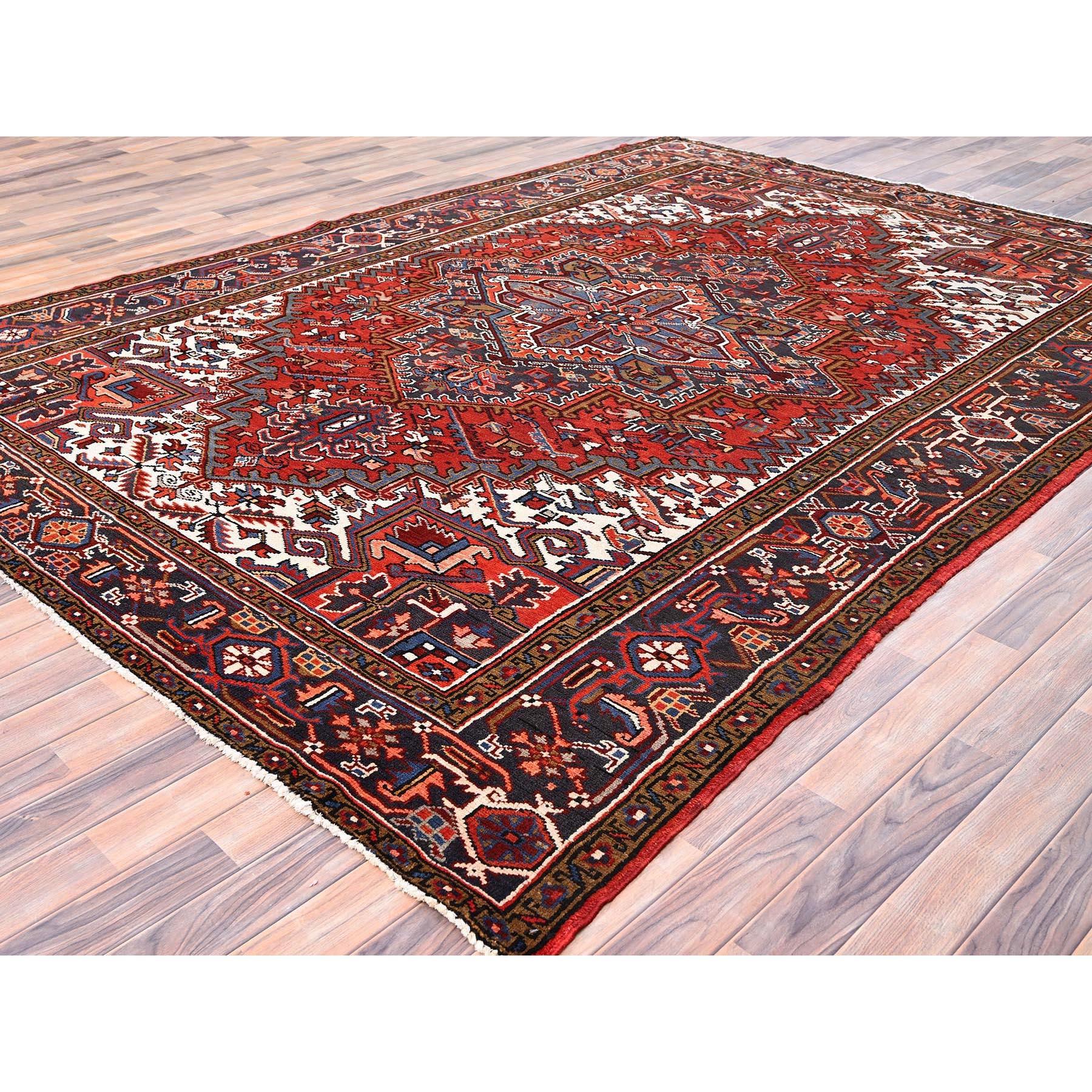 Red Vintage Persian Heriz Village Motif Rustic Feel Worn Wool Hand Knotted Rug In Good Condition For Sale In Carlstadt, NJ