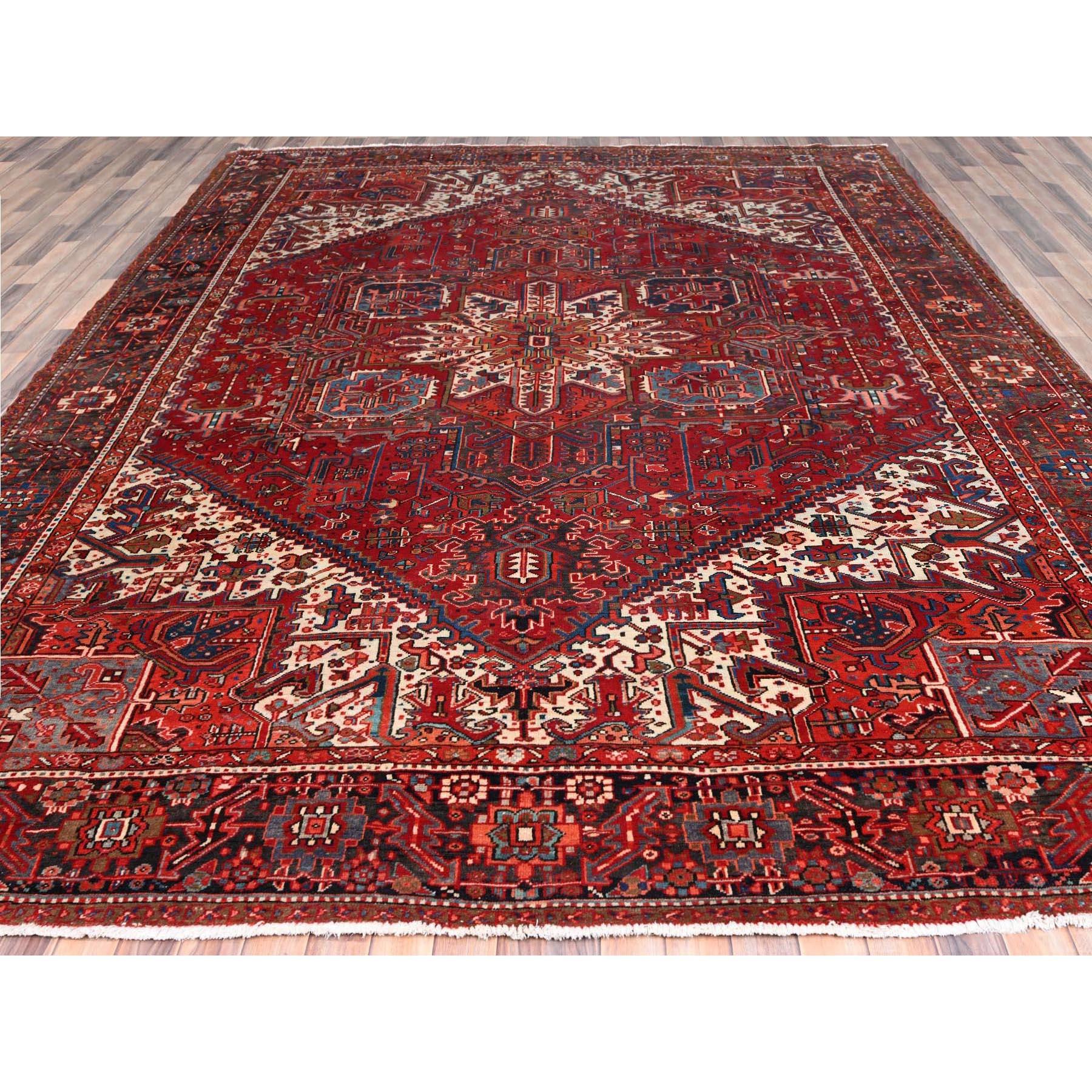 Heriz Serapi Red Vintage Persian Heriz with Tribal Ambience Rustic Look Wool Hand Knotted Rug For Sale