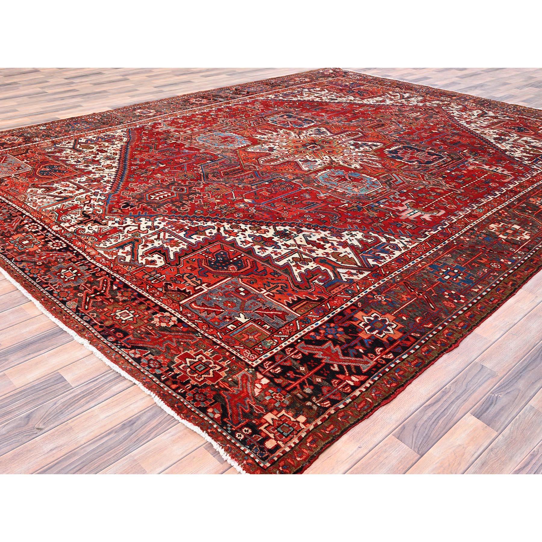 Hand-Knotted Red Vintage Persian Heriz with Tribal Ambience Rustic Look Wool Hand Knotted Rug For Sale