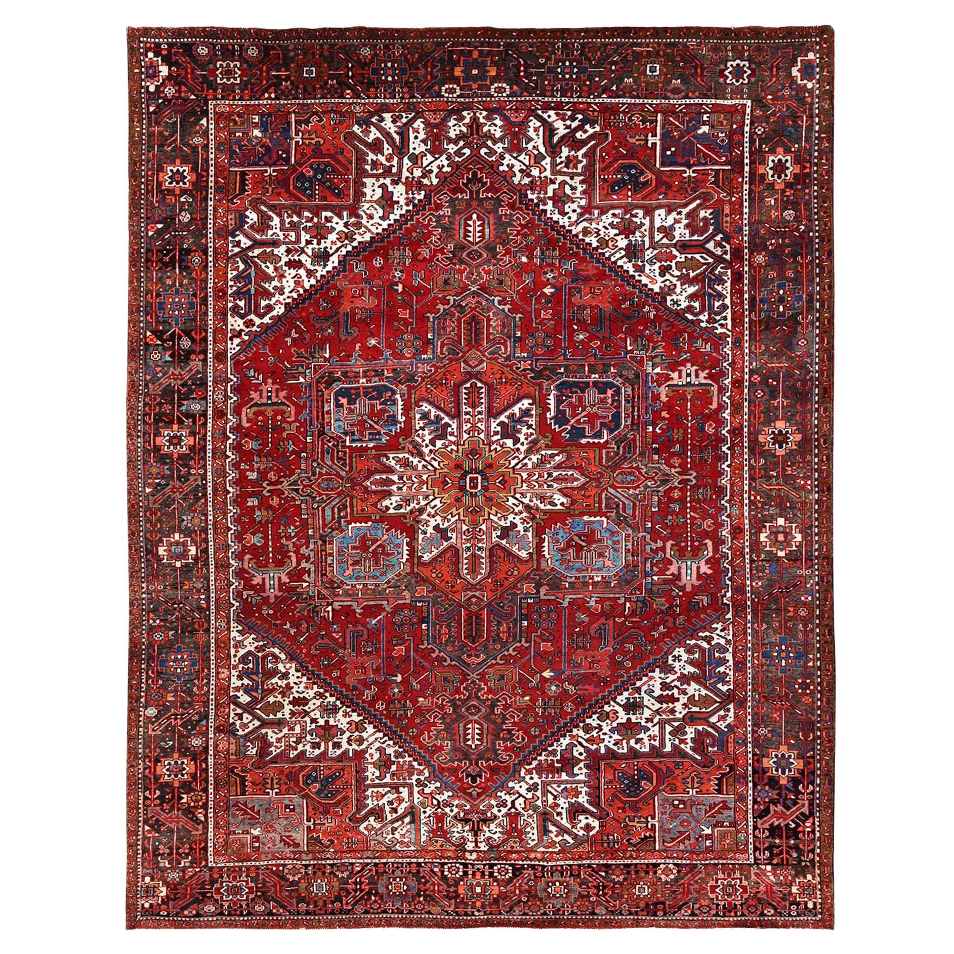 Red Vintage Persian Heriz with Tribal Ambience Rustic Look Wool Hand Knotted Rug For Sale