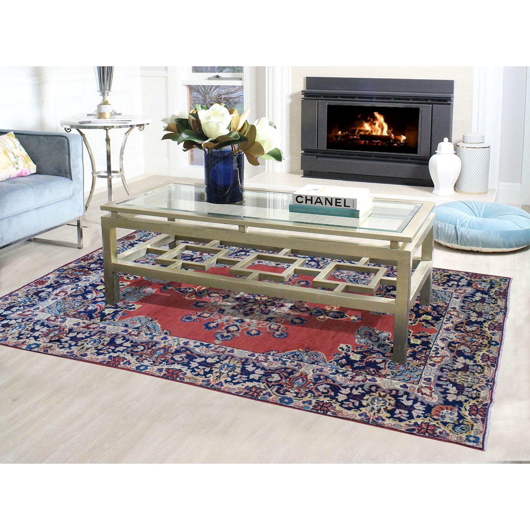 This is a truly genuine one-of-a-kind red vintage Persian Mahal open field pure wool hand knotted Oriental rug. It has been knotted for months and months in the centuries-old Persian weaving craftsmanship techniques by expert artisans. 

Primary