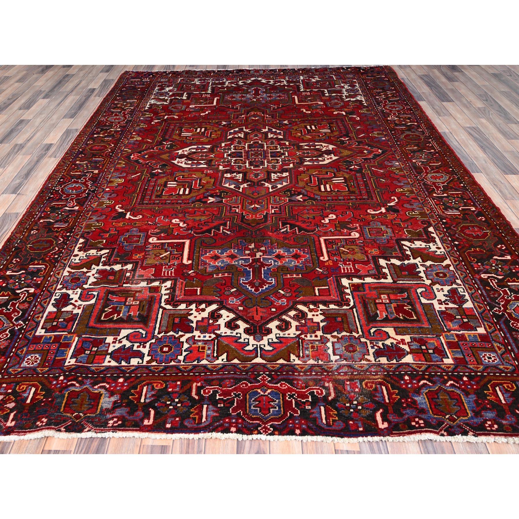 Medieval Red Vintage Shiny Wool Persian Heriz Design Hand Knotted Clean Worn Down Rug For Sale