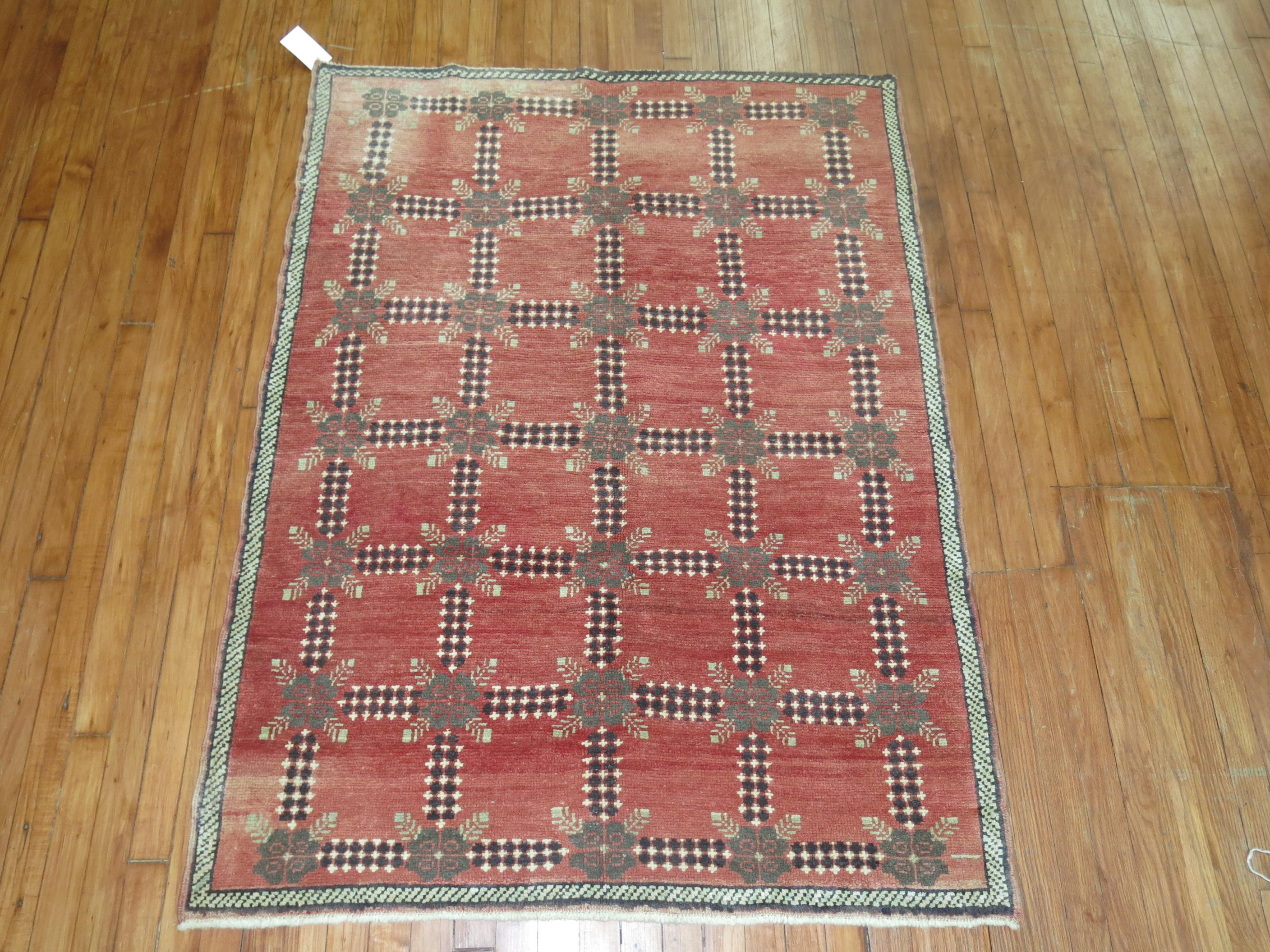 Red color Turkish rug from the middle of the 20th century. 

Measures: 3'11'' x 5'3''.