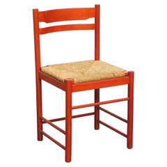Roter Vintage-Stuhl aus Holz der 1970er Jahre mit geflochtenem Sitz