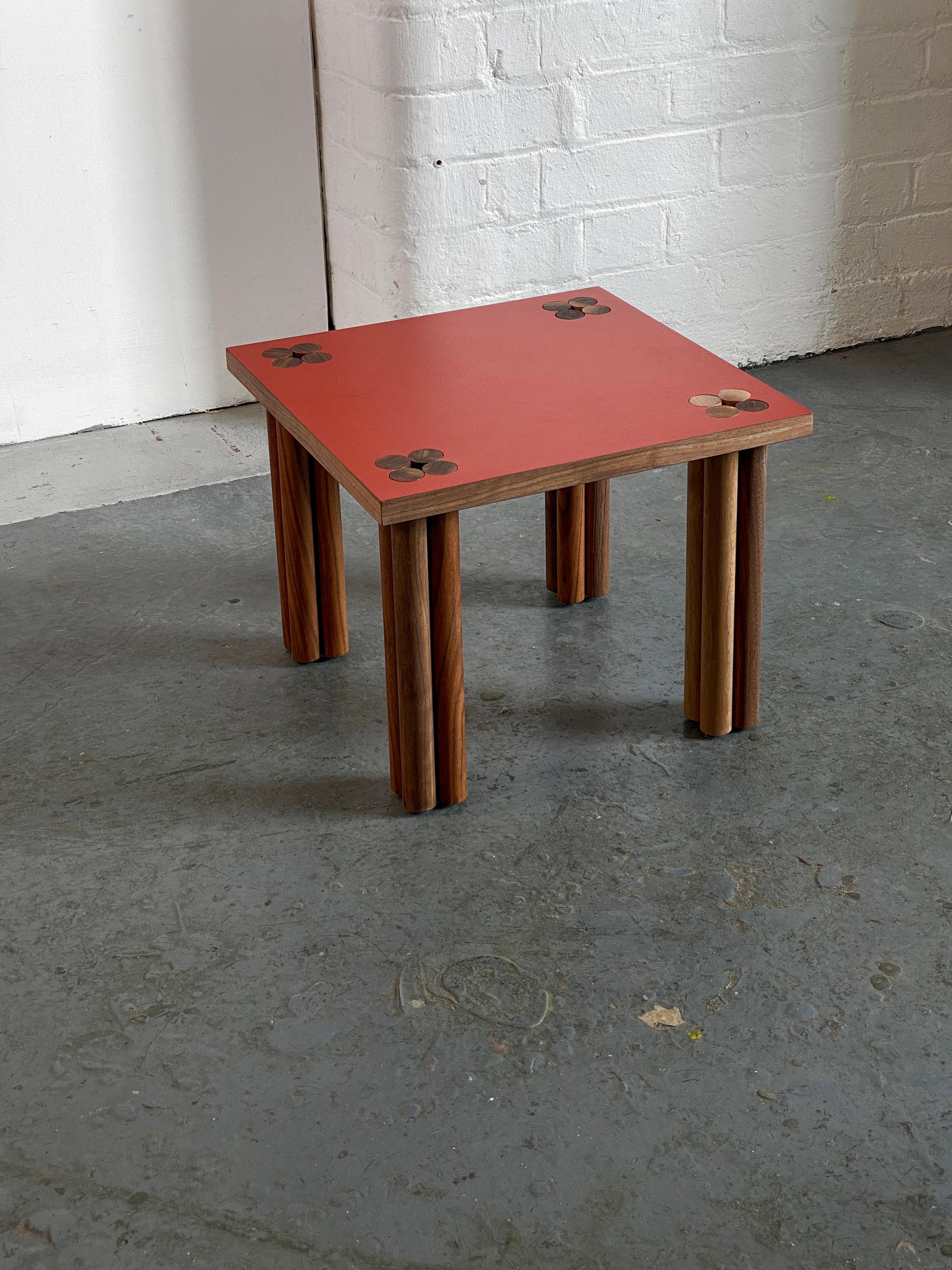 Red (Paprika) & Walnut Hana side table
Dimensions: D 35 x W 35 x H 33 cm
Materials: Solid walnut wood, walnut veneer, Formica
Oak or other wood possible. 

Hana is Japanese and means flower - it is a collection of side tables and a sideboard.