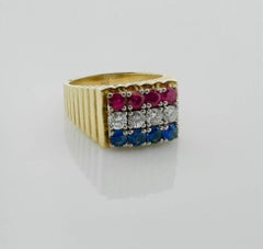 Red-White and Blue Diamond Sapphire and Ruby Ring in 18 Karat
