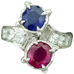 Antique Red, White and Blue Sapphire, Ruby and Diamond Ring in White Gold, circa 1940s