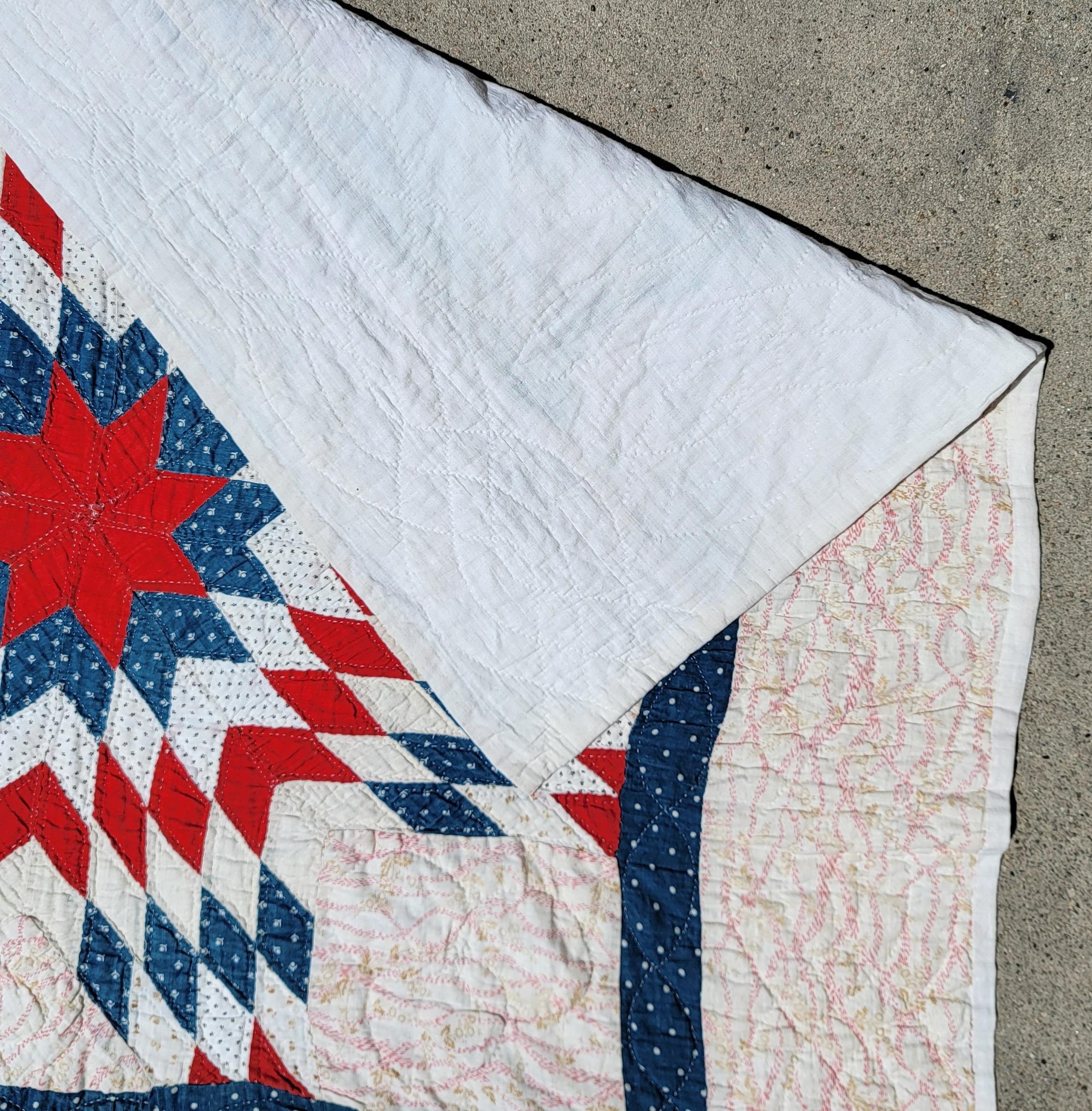 This patriotic star crib quilt is in great condition and very graphic.