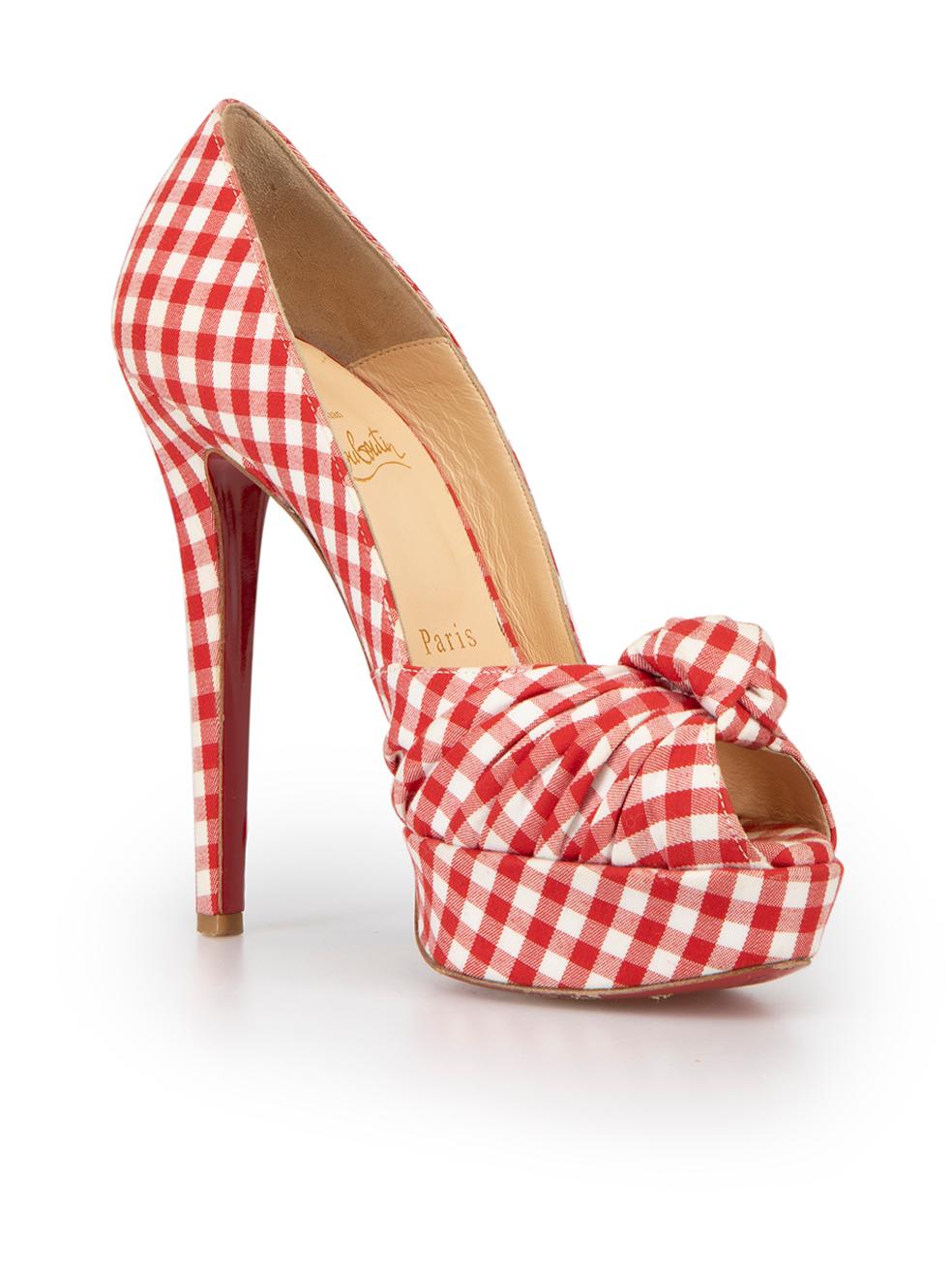 CONDITION is Very good. Hardly any visible wear to shoes is evident on this used Christian Louboutin designer resale item.



Details


Red and white

Cloth textile

Gingham pattern heels

Peep toe

Platform high heel

Knot accent





Made in