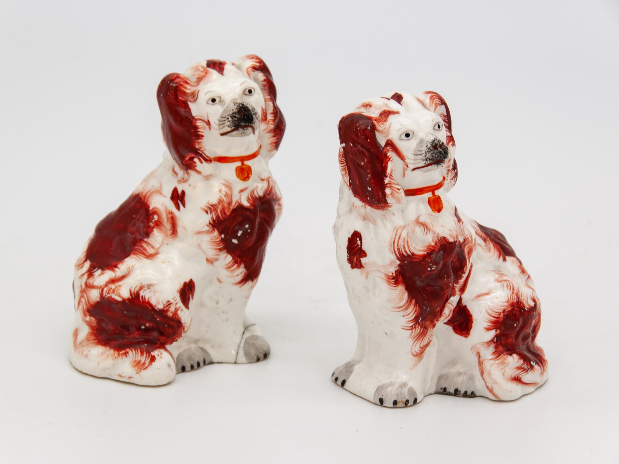 Pair of red and white Staffordshire dog, ca 1900