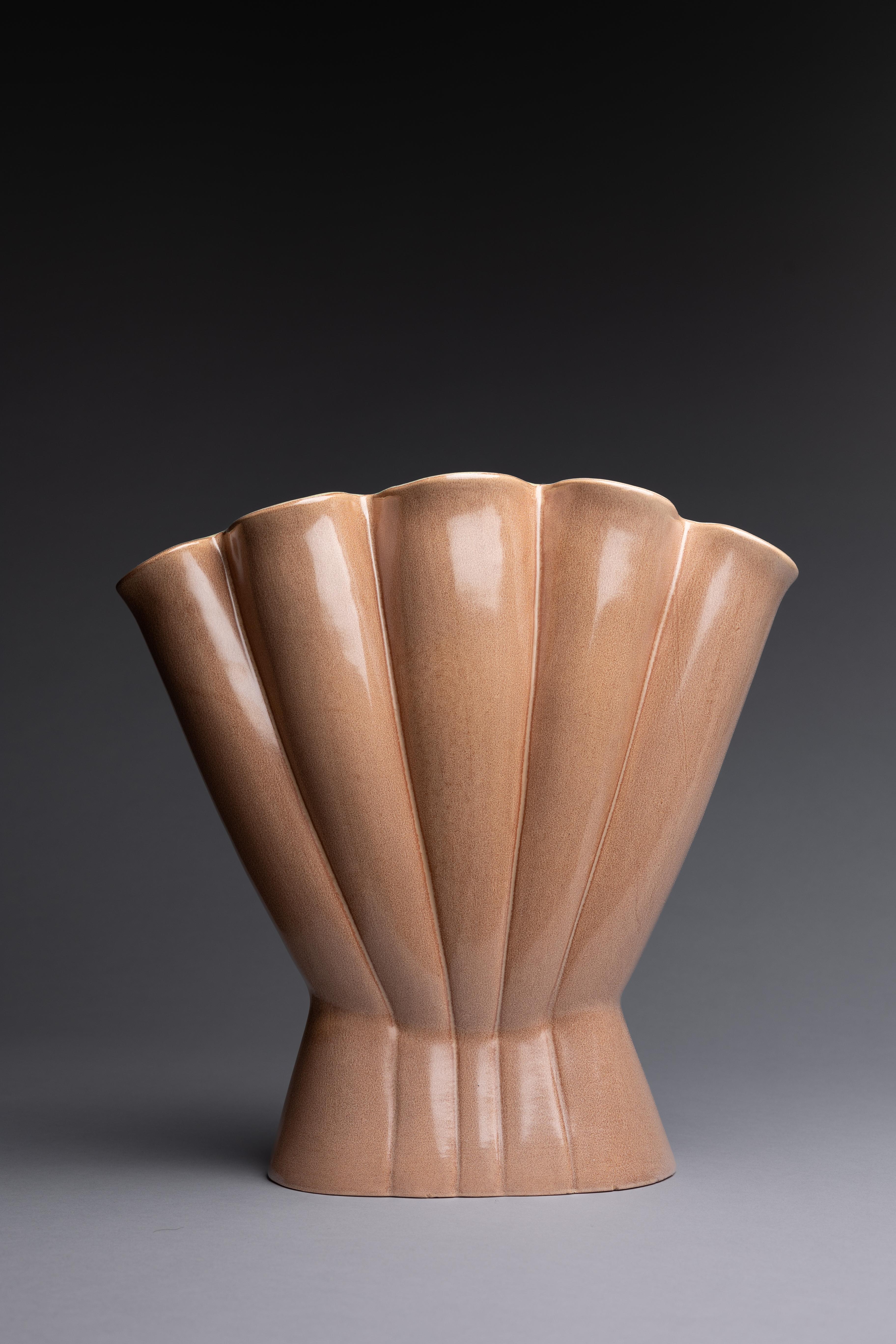 A Red Wing Potteries light pink vase, made circa 1950.

In the years after World War II, Western makers approached their designs with a spirit of optimism and dynamism. The mid-century modern style was a result of that energy, incorporating