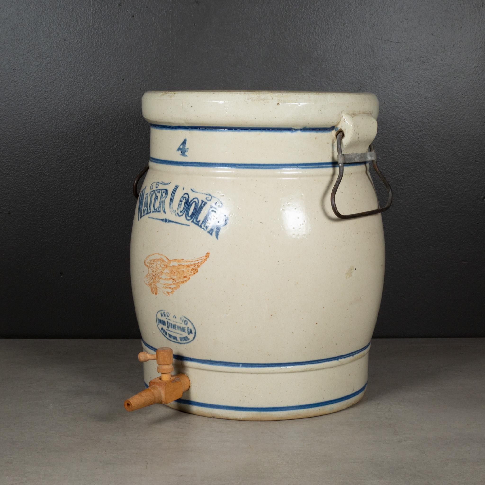 ABOUT

An original hand turned 4 gallon Red Wing Water Cooler crock with metal handles and wooden spigot. The piece has retained its original finish.

    CREATOR Red Wing Union Stoneware Company, Minnesota.
    DATE OF MANUFACTURE c.1909-1915
   