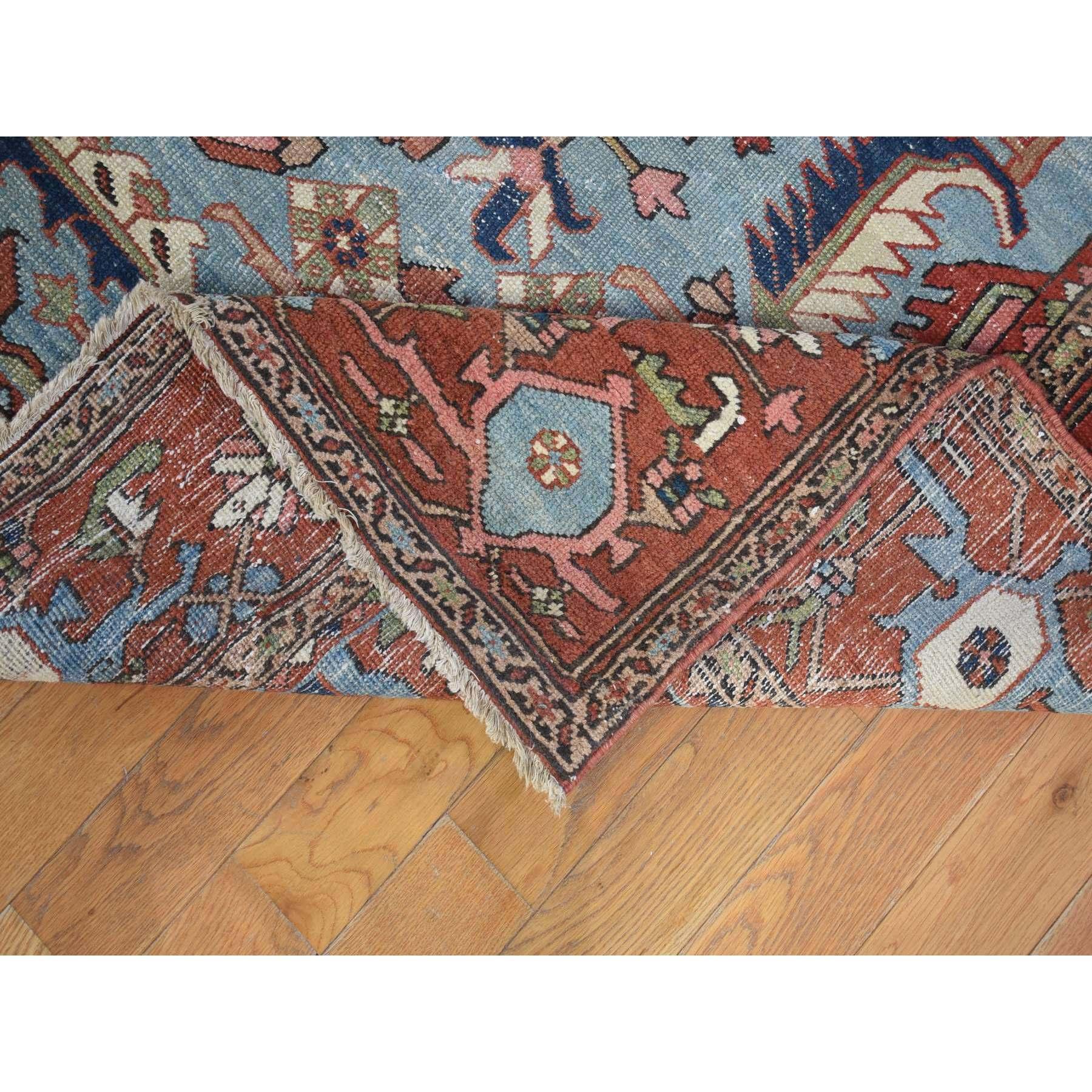 Hand-Knotted Red with Light Blue Corners Antique Persian Serapi Heriz Hand Knotted Wool Rug For Sale