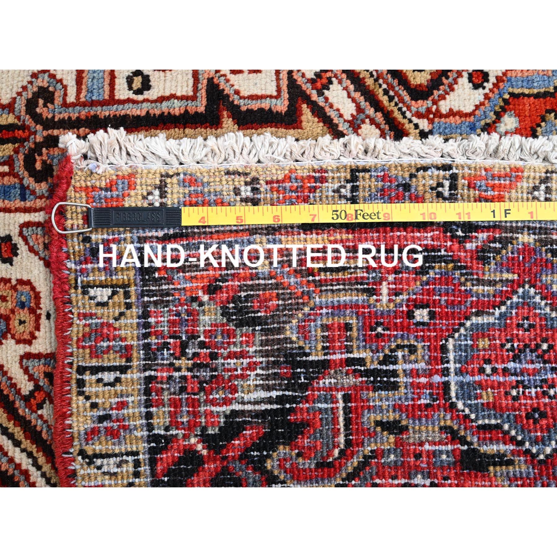 Medieval Red Wool Hand Knotted Vintage Persian Heriz Evenly Worn Clean Sides and Ends Rug For Sale