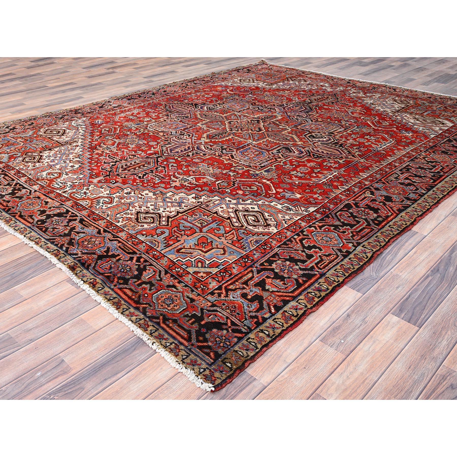 Mid-20th Century Red Wool Hand Knotted Vintage Persian Heriz Evenly Worn Clean Sides and Ends Rug For Sale
