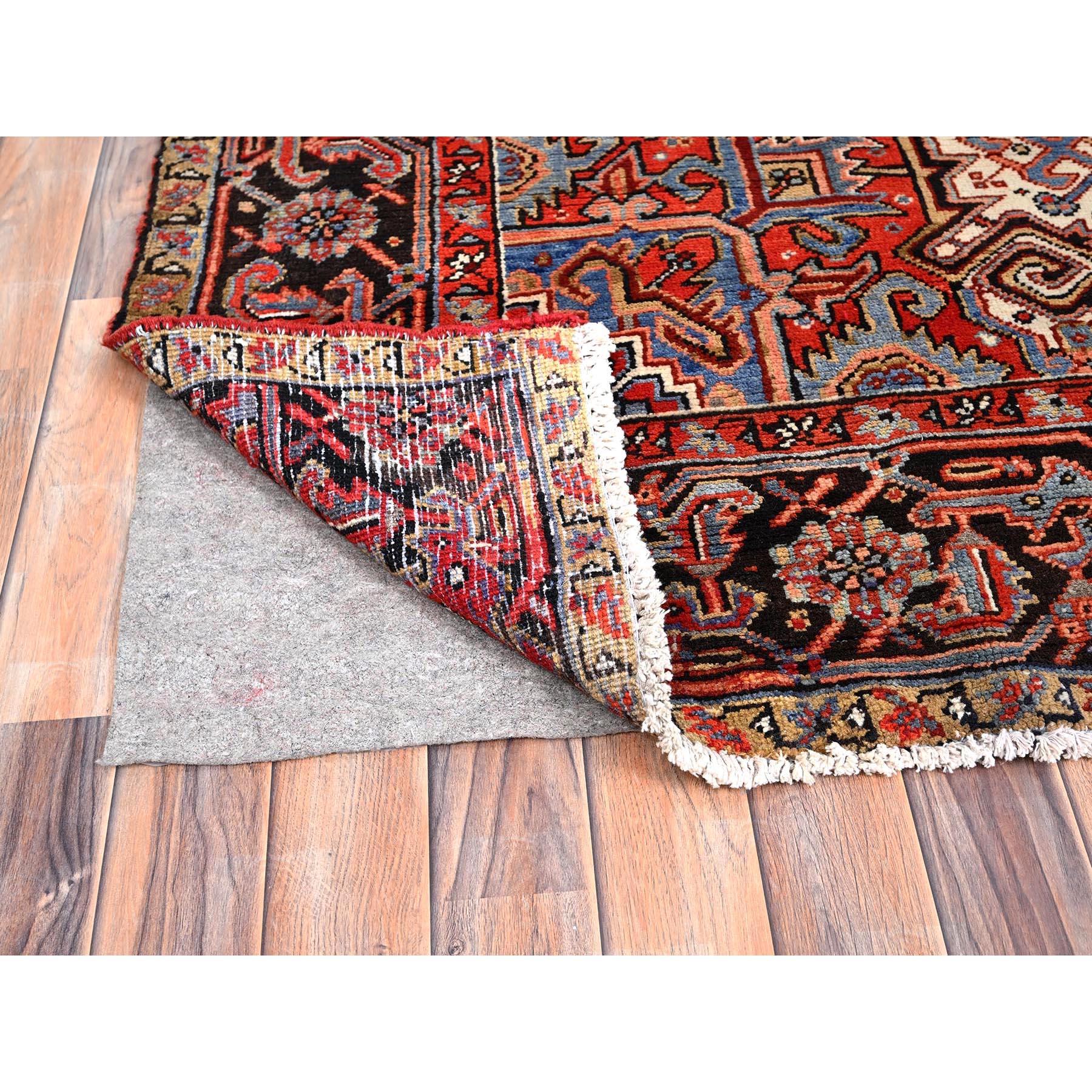 Red Wool Hand Knotted Vintage Persian Heriz Evenly Worn Clean Sides and Ends Rug For Sale 1