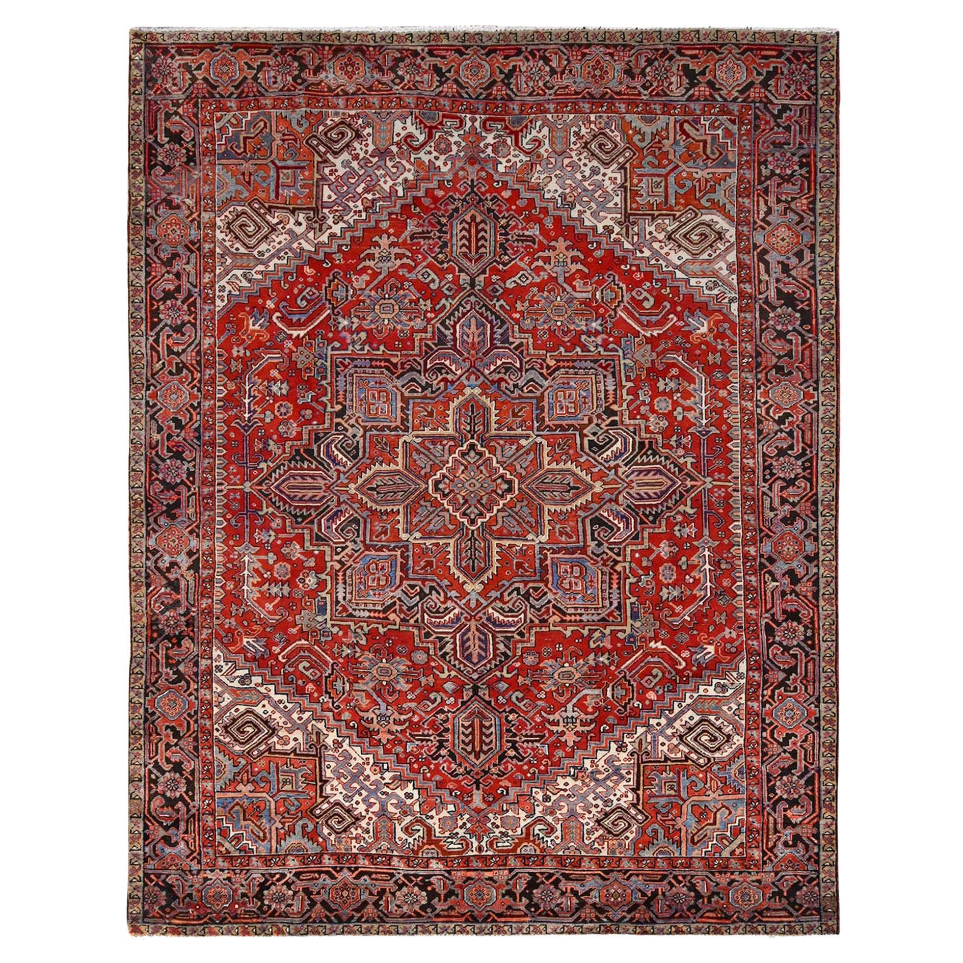 Red Wool Hand Knotted Vintage Persian Heriz Evenly Worn Clean Sides and Ends Rug For Sale