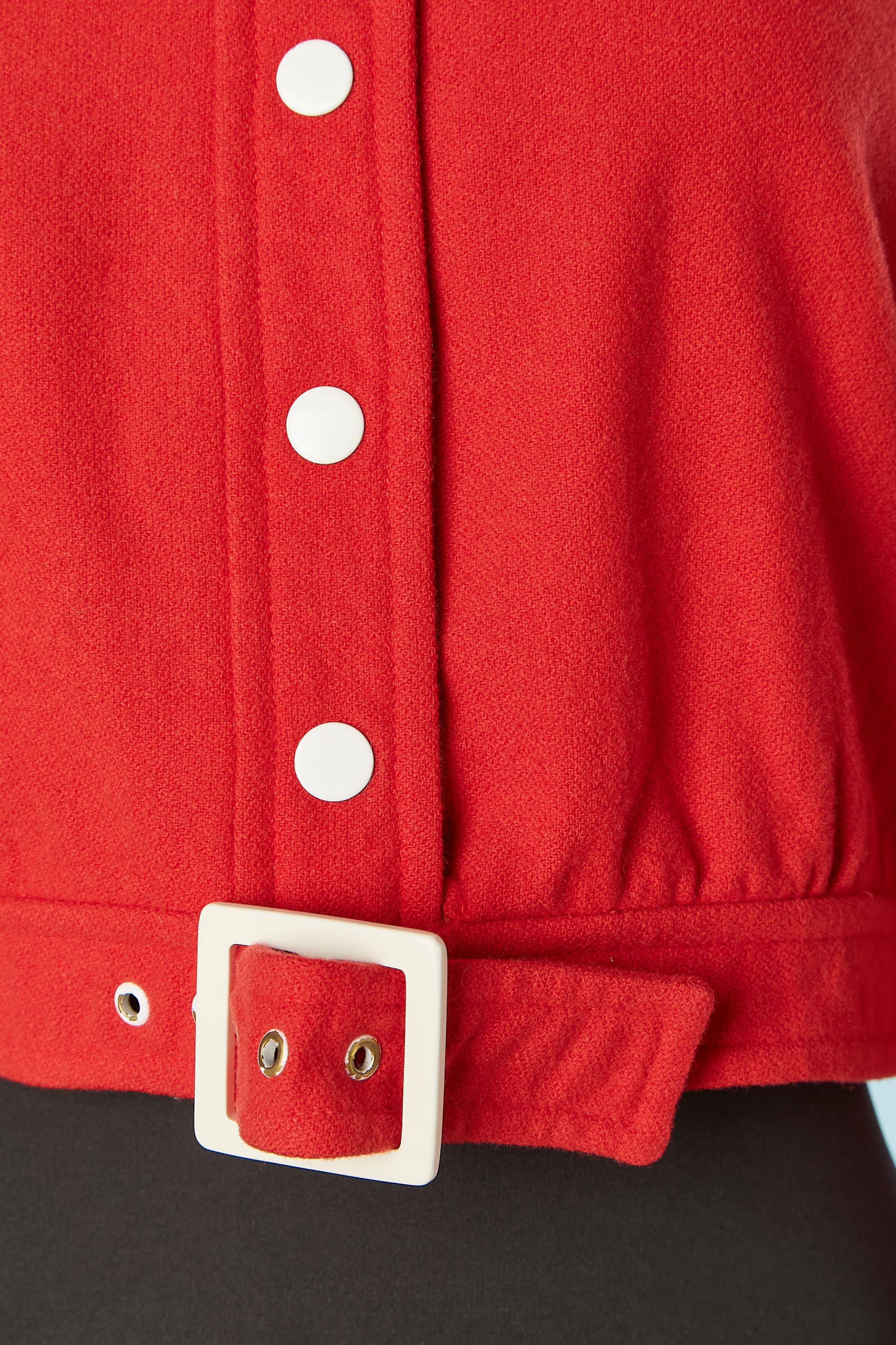 Red wool short jacket with white snaps and buckle. Acetate lining. 
Numbered: 0543809
SIZE 