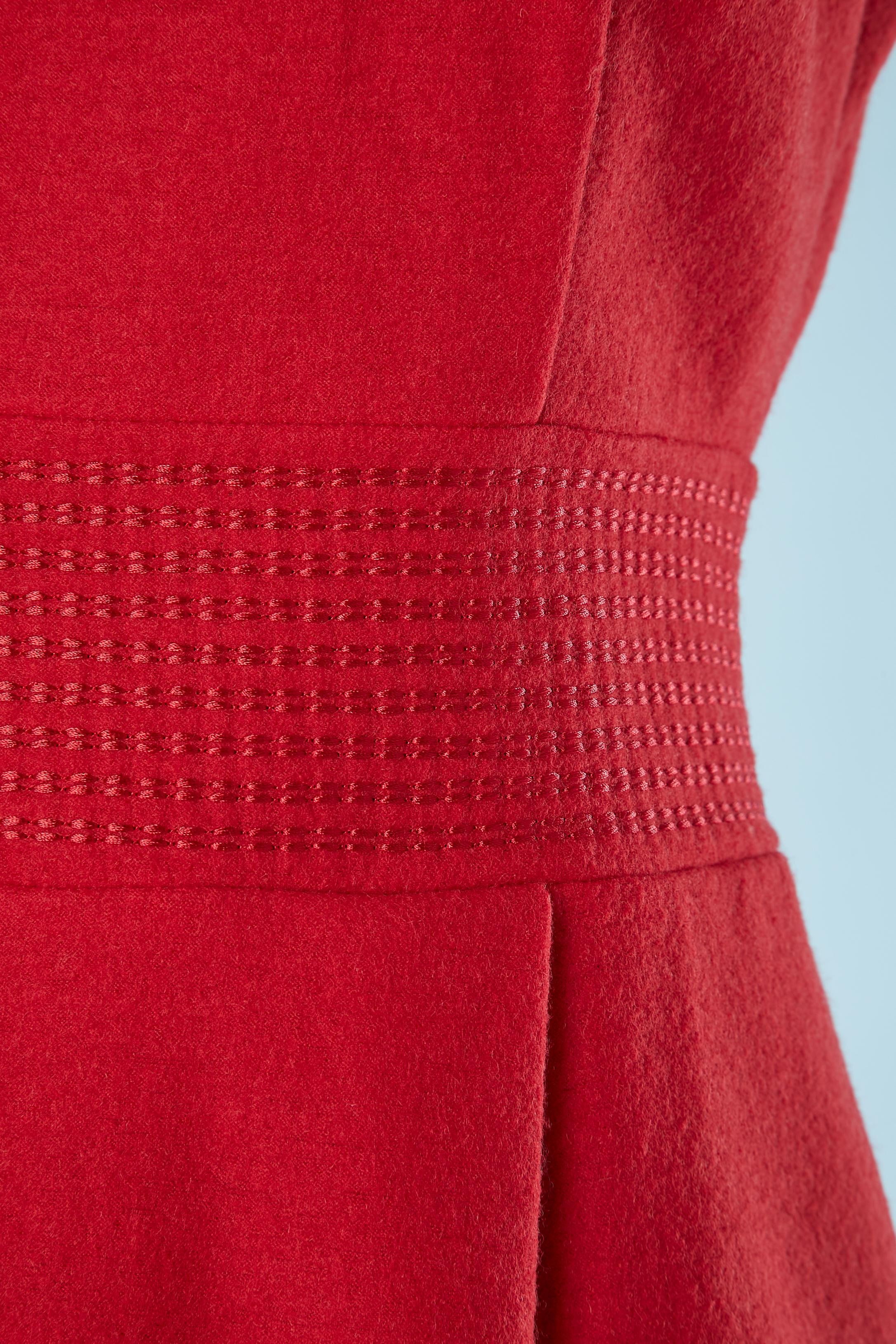 Red wool short sleeve dress. Zip and hook& eye in the middle back. Polyester lining. Top-stitched waist band.
SIZE S