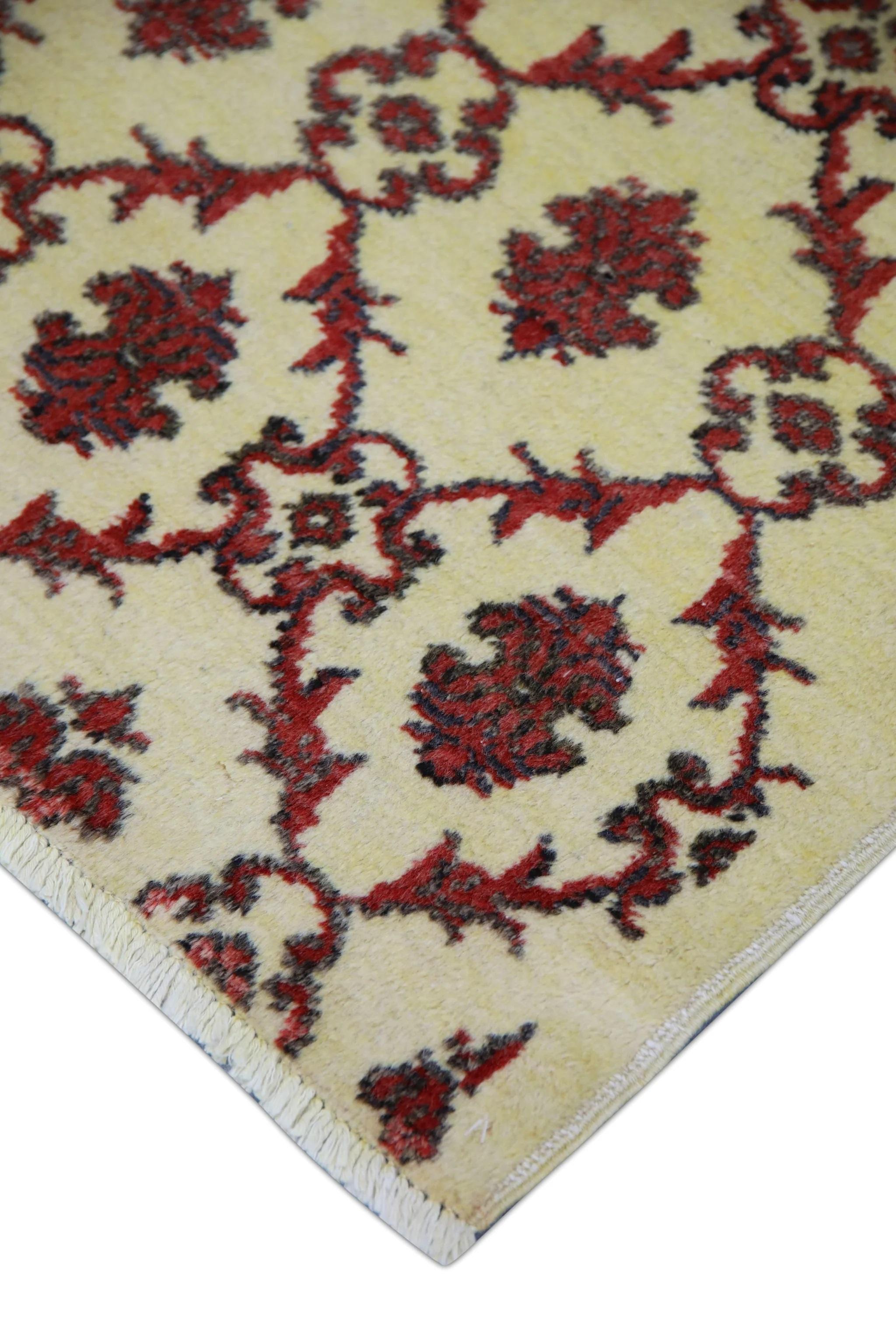 This exquisite vintage Turkish Oushak rug is a stunning example of traditional craftsmanship and timeless beauty. Hand-knotted from premium wool fibers, this rug features intricate patterns and vivid colors that are all naturally derived from