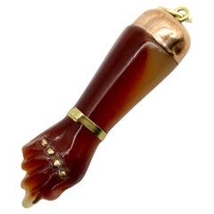 Reddish Brown Celluloid Figa with 9K Gold Cap and 14K Gold Bail