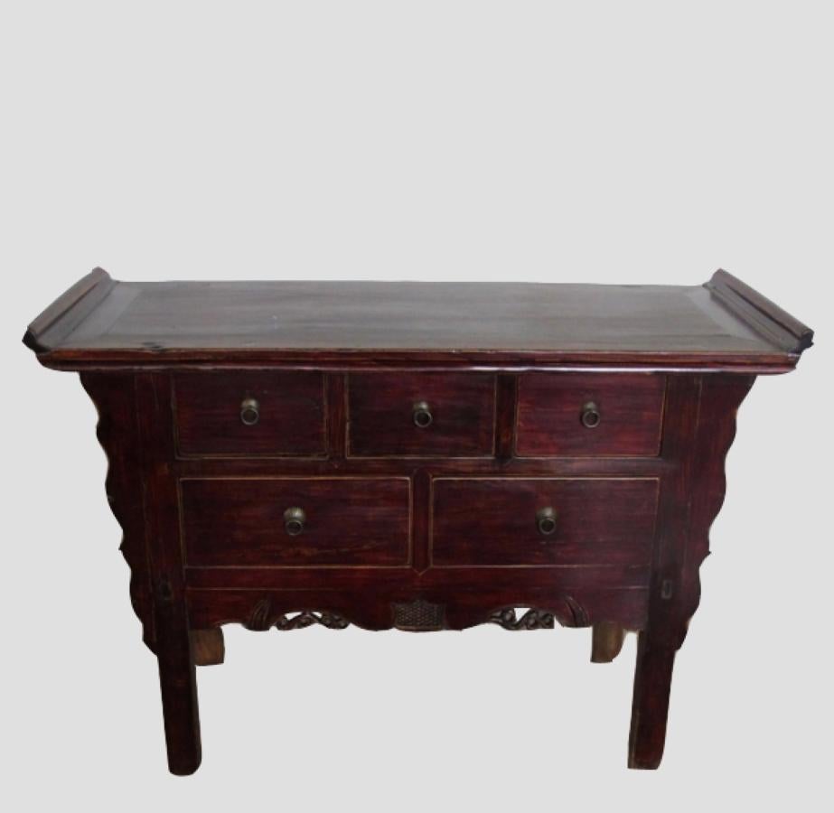 Used as an altar for ancestor worshipping, this antique Chinese altar table is well suited as an exotic Asia console table for displaying your favourite objects.