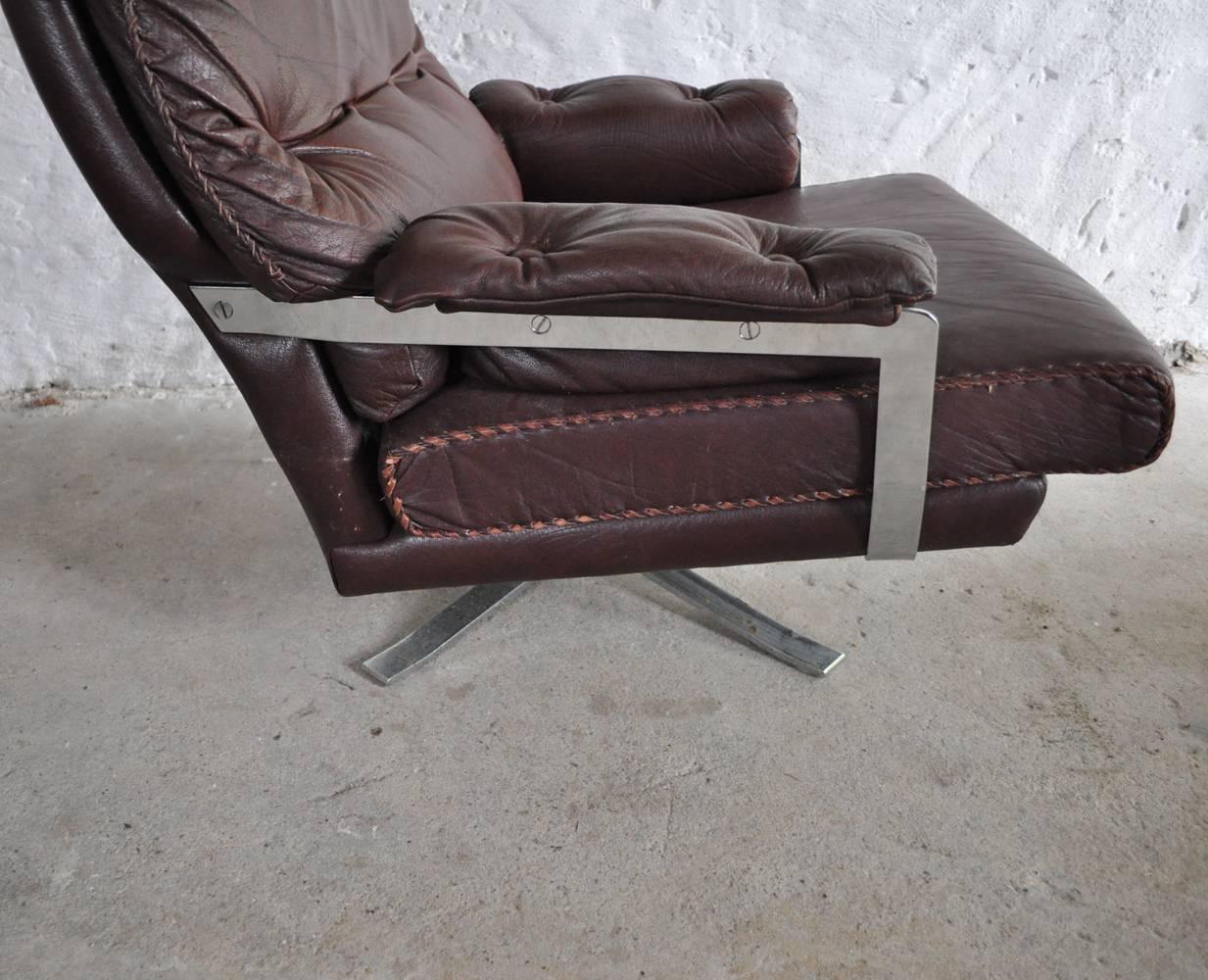 Reddish Brown Leather and Chrome Lounge Chair and Stool by Arne Norell For Sale 3