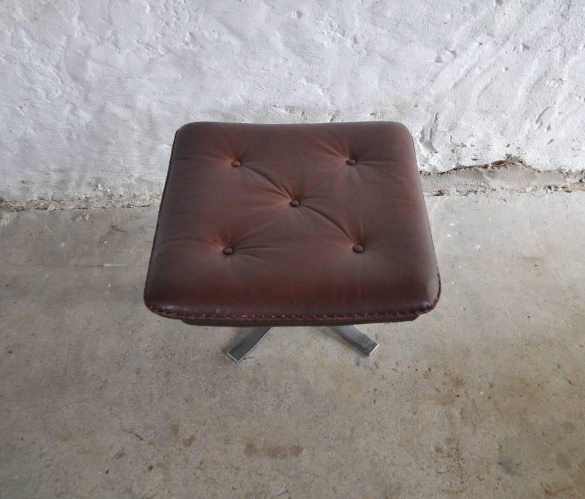 Reddish Brown Leather and Chrome Lounge Chair and Stool by Arne Norell For Sale 6