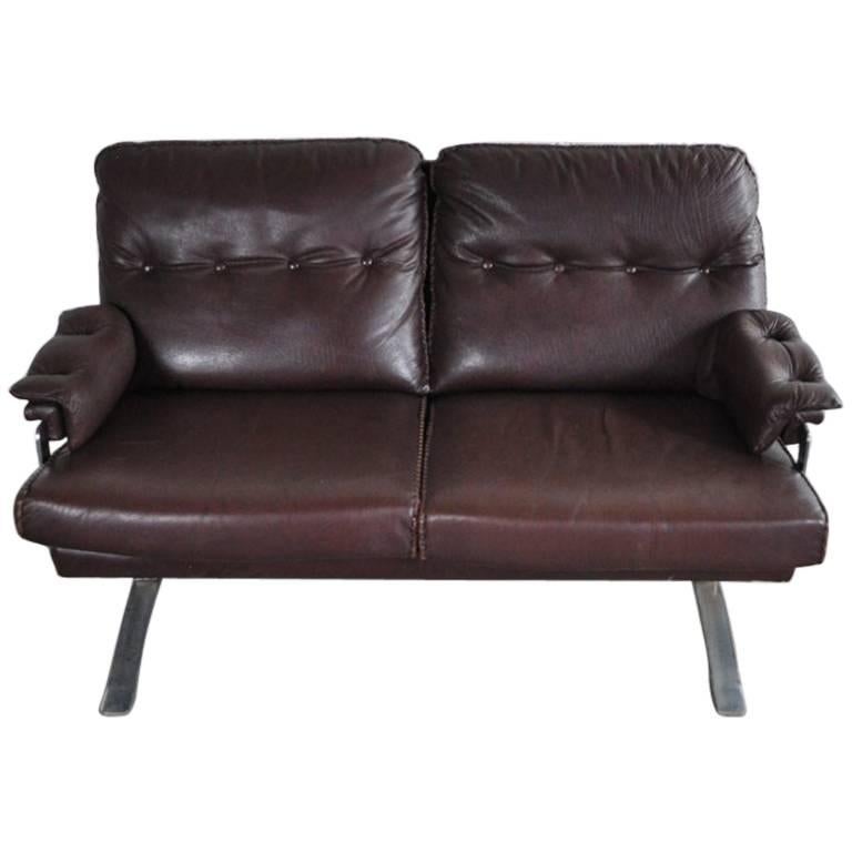 Reddish Brown Leather and Chrome Sofa by Arne Norell For Sale