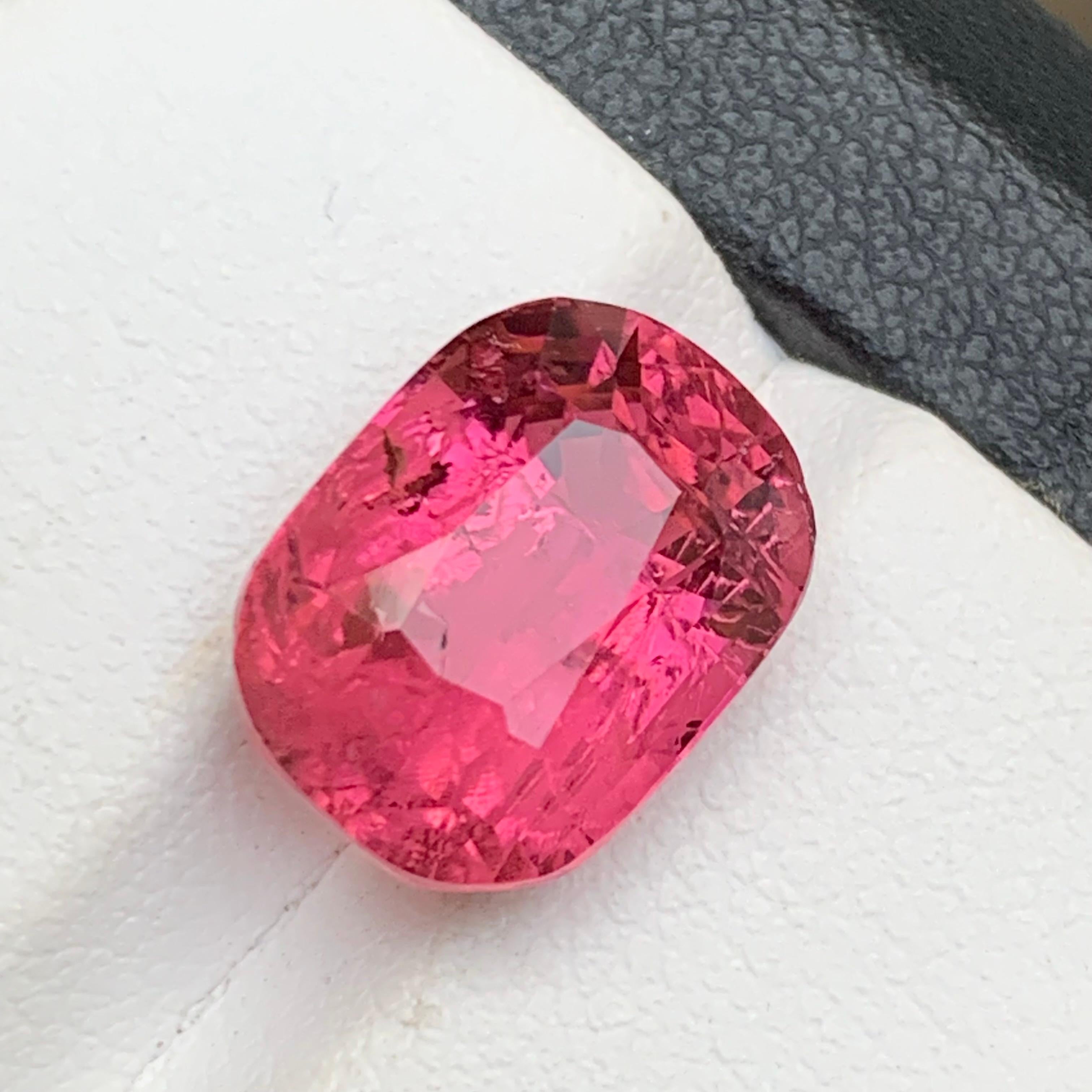 Reddish Hue Vivid Pink Natural Tourmaline Loose Gemstone for Ring, Pendant or any other Jewelry Setting-Cushion Cut from Kunar, Afghanistan!!

💎 GEMSTONE TYPE: Tourmaline
⚖️ WEIGHT: 7.90 Carats
🪚 SHAPE & CUT: Cushion
📏 SIZE (MM): 12.89 x 9.66 x