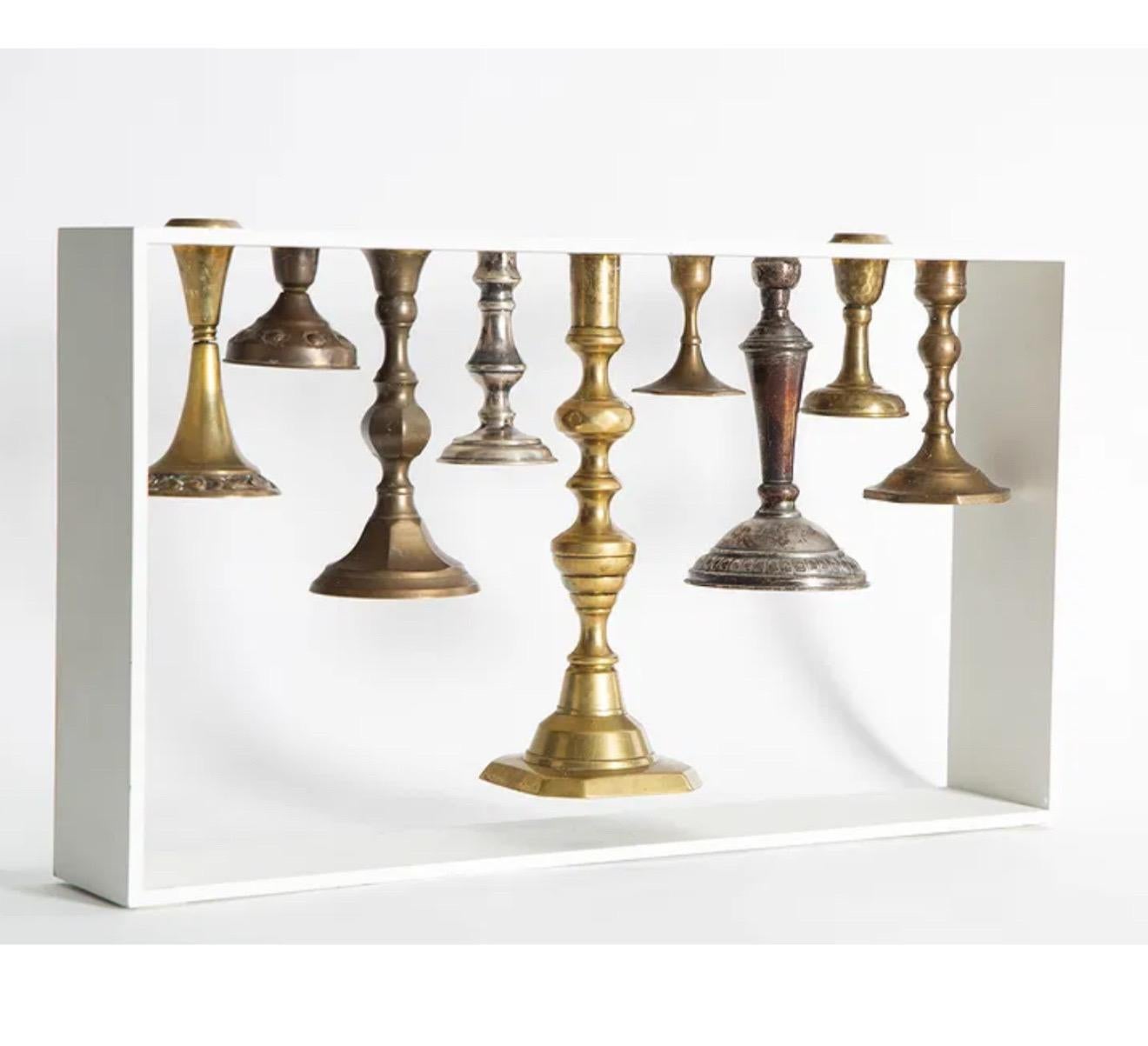 Reddish Studio
Naama Steinbock and Idan Friedman
Candlestick United
2008
Handmade and limited edition menorah
colored cast iron frame, found candlesticks
Each one off (these are each unique)
Limited Edition Chanukah Menorah
Dimensions: 28 x 49 x 8.5