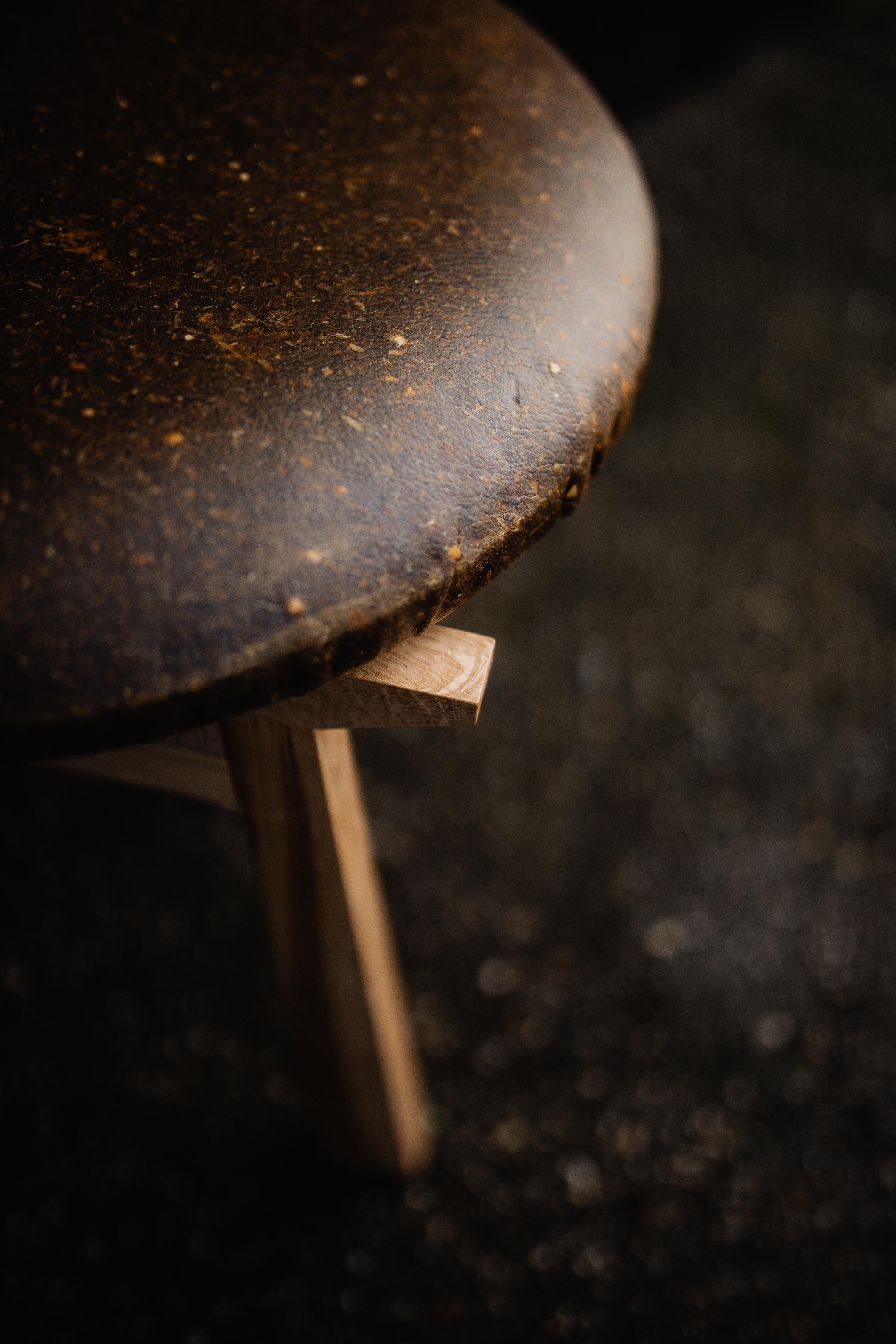 This dining chair is hand made in hard wood that is sustainably sourced, covered with a natural oil to bring out the woods natural colors and grains. The seat is made from Mango leather from a company called - Fruitleather 

This furniture piece was