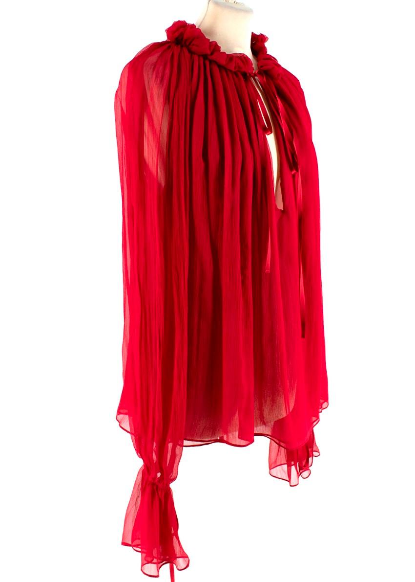 Camicetta di seta rossa Redemption

- Vestibilità ampia
- Fabrice in crepon di seta trasparente 
- Colletto increspato
- Maniche scanalate annodate 
- Cravatta al collo 
- Leggero

Materiali:
Tessuto principale:
- 100% seta 
Abbellimento:
- 100%
