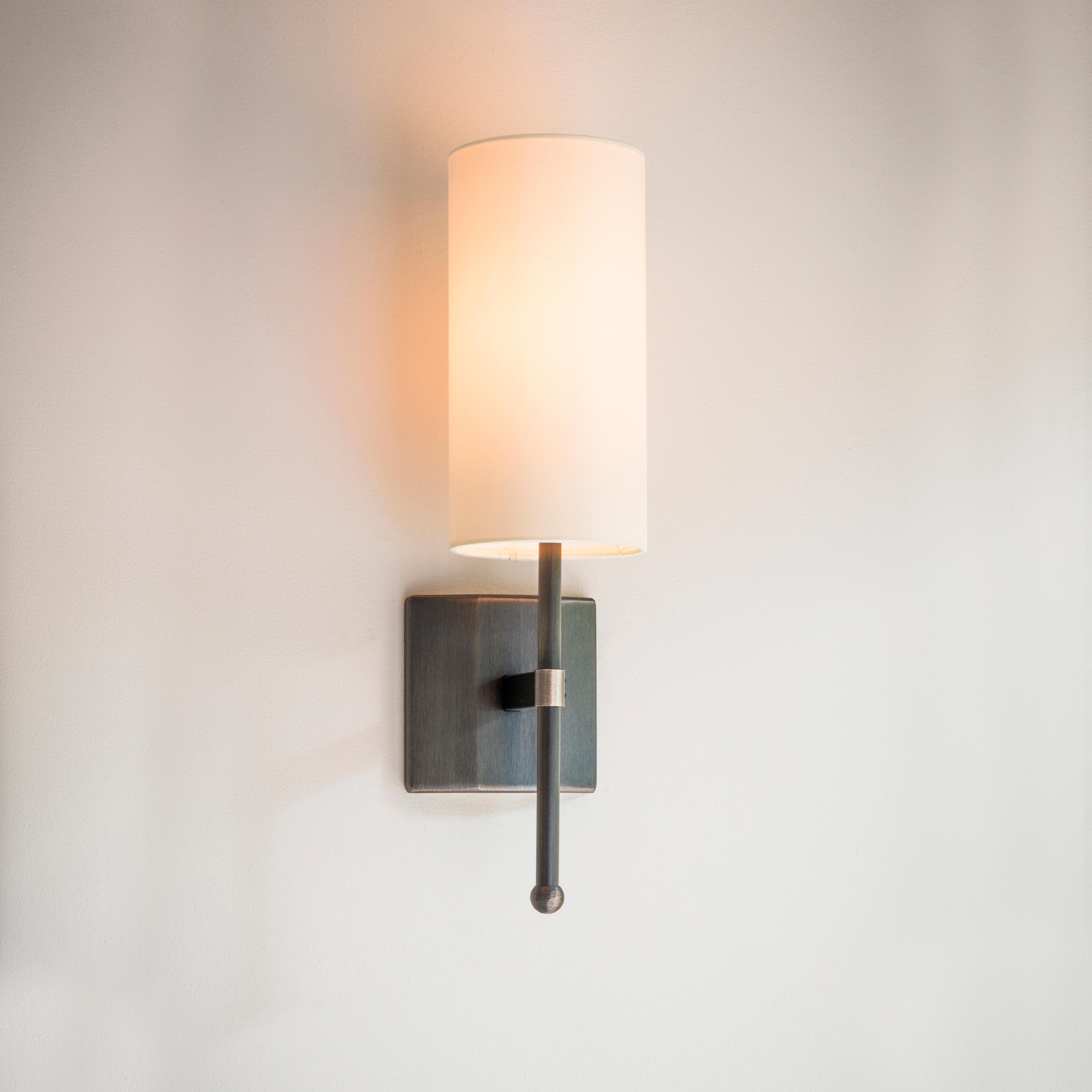 An elegant handcrafted metal stem frame, supporting silk douppion shades. The hand-grained patinated Bronze metalwork is perfectly balanced by the richness of silk shades.

Designed and handmade by Tigermoth Lighting on the banks of the river