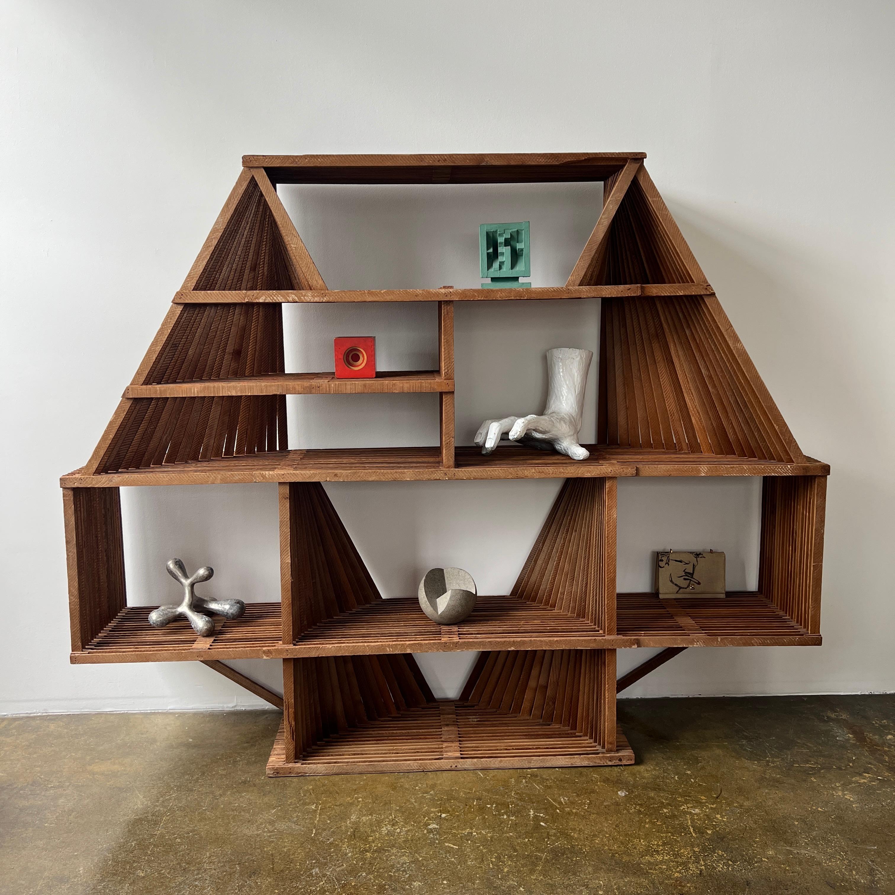 An architectural wood shelf like no other. The scale is as impressive as the design. You will never see this one again.