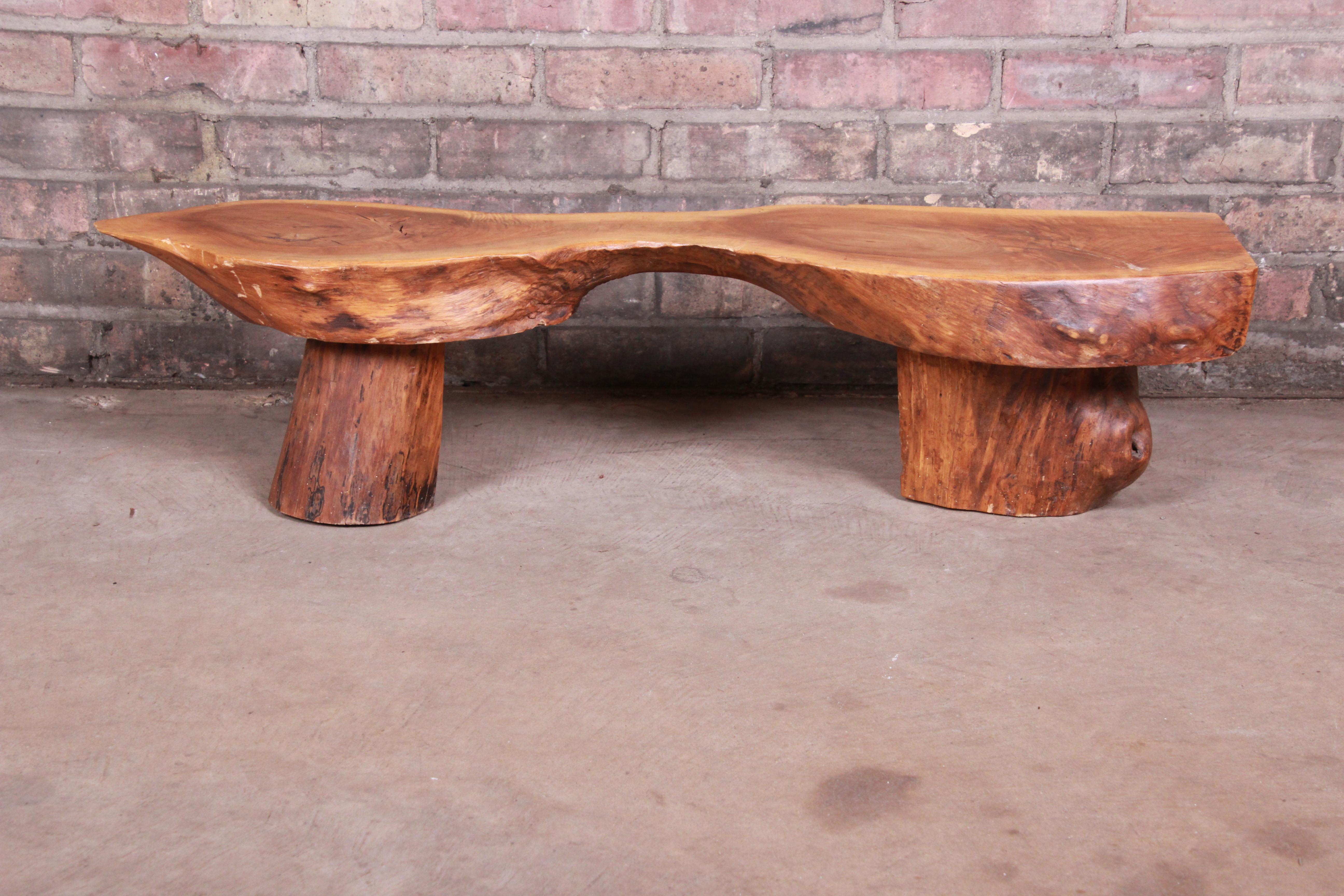 A unique handcrafted redwood rustic live edge low coffee table or occasional side table

Mid-20th century

Measures: 37