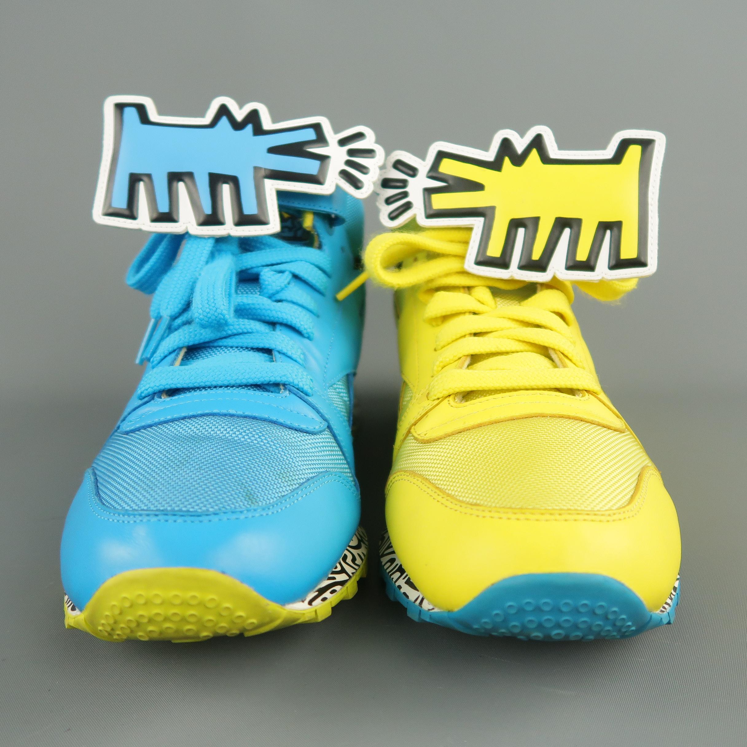 Special edition KEITH HARING FOUNDATION X REEBOK collaboration trainers come in yellow and aqua blue leather and canvas with a black and white scribble print sole, lace up front, and velcro strap with dog barking patch.
 
Excellent Pre-Owned
