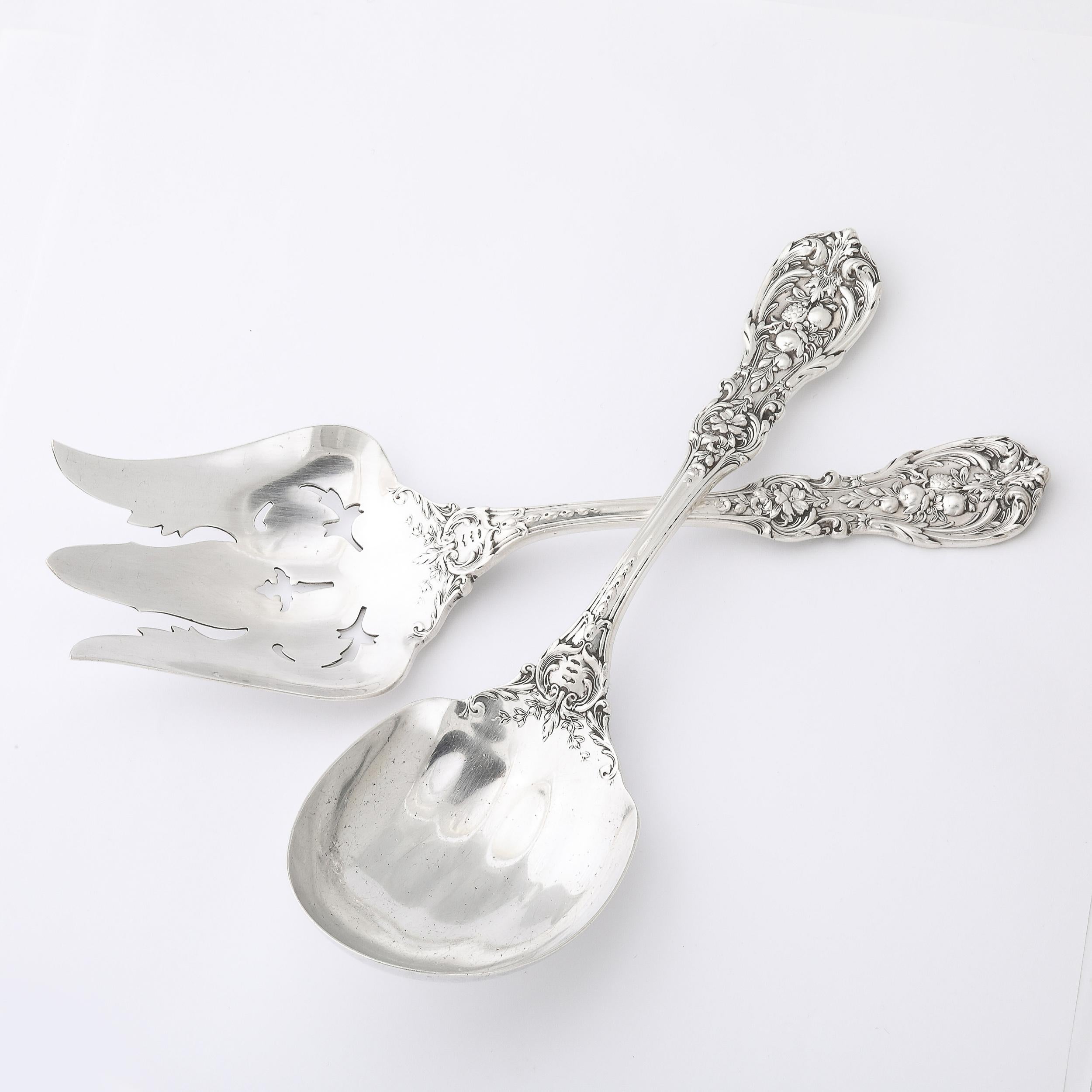 This beautifully detailed and well balanced Reed and Barton Francis I Pattern Sterling Silver Serving Spoon & Fork Set originates from the United States, Circa 1950. Features a lovely profile complimenting one another functionally and visually, this