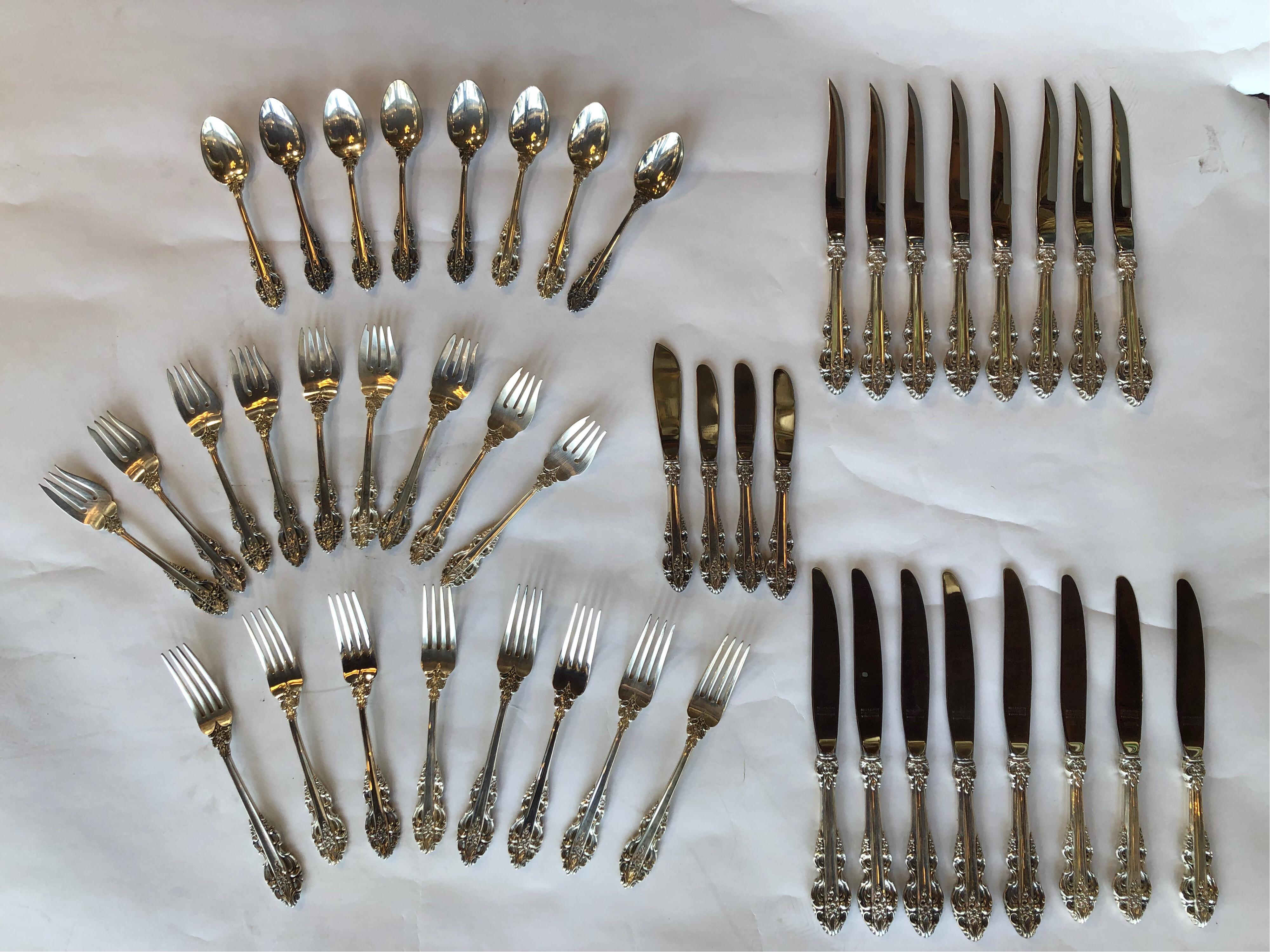 Sterling silver salad and dinner forks, teaspoon, steak and butter knives. Stamped Reed and Barton.