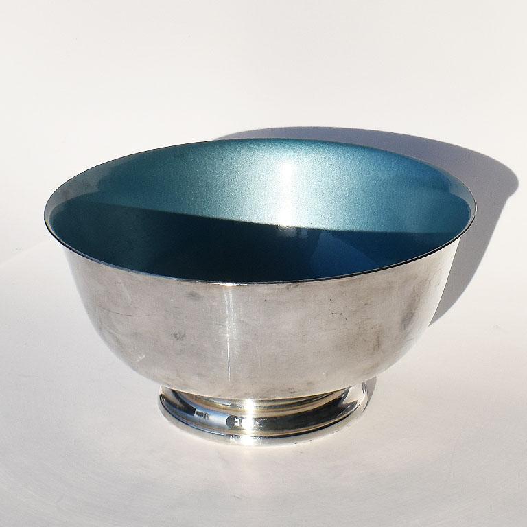 Silver and cerulean blue enameled Paul Revere bowl. A lovely piece with a form that is rich in history. Made in Massachusetts, the same place where the original Paul Revere serving dish was created. With a traditional silhouette and handsome silver