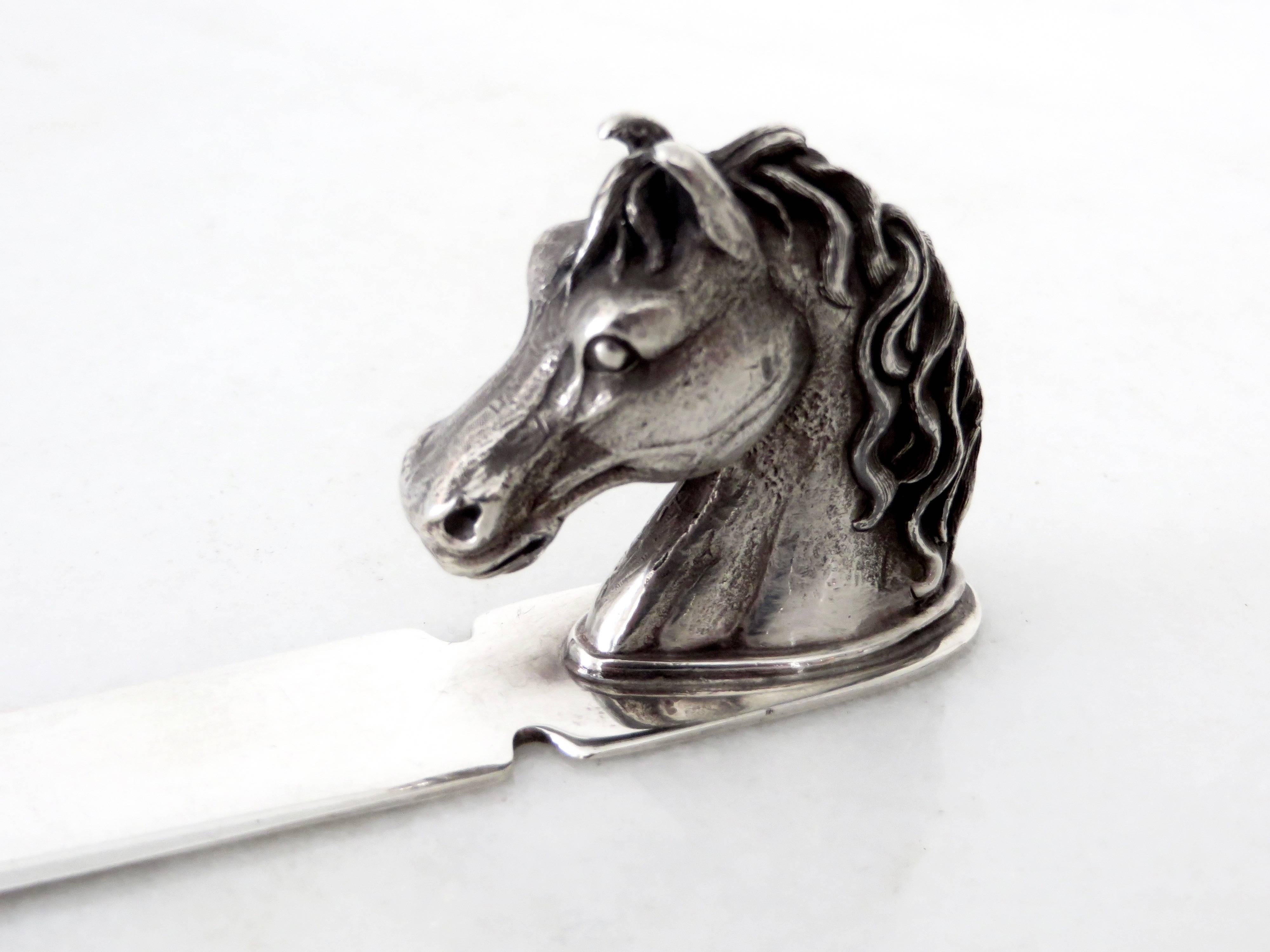 Reed and Barton silver plate letter opener featuring a finely detailed horse head as the handle.
It has been used affectionally by the previous owner and the head of the horse has great patina as well.
Stamped.