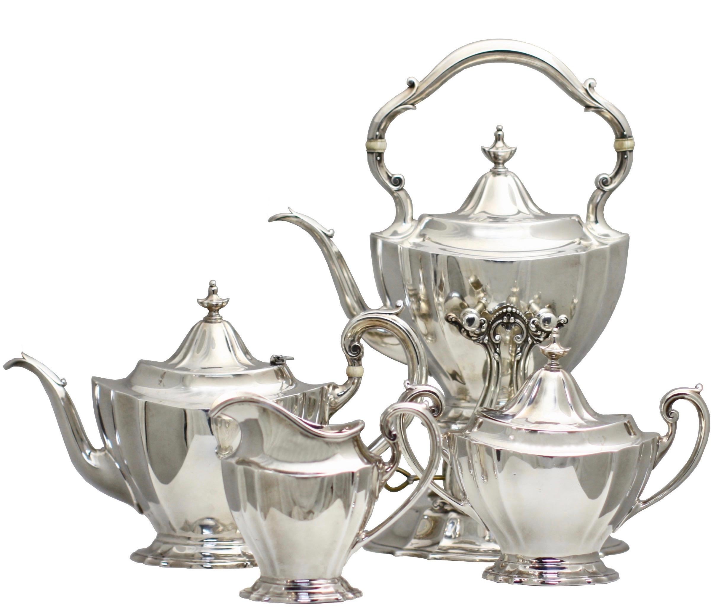 Reed And Barton Sterling Silver Four-Piece Tea And Coffee Service with a Tiffany & Co. Silver Plated Tray
1928, marked with Reed and Barton eagle symbols, Sterling, 650.b, the tray marked Tiffany & Co., 
Each piece of urn shape with loop handles,