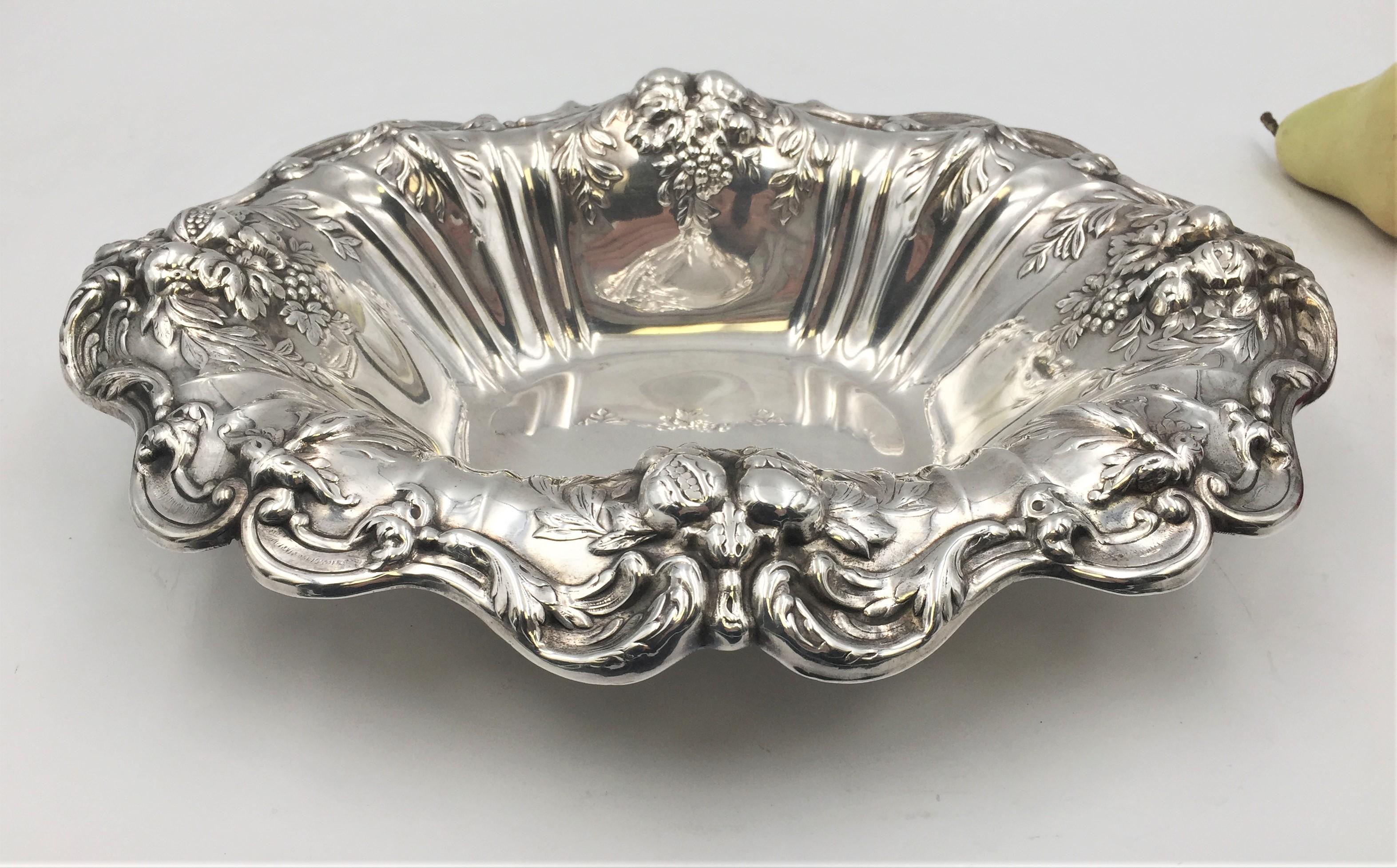 Reed & Barton Francis I sterling centerpiece bowl in pattern X566 and in Art Nouveau style. Designed with a grape, pomegranate, and vine motif. Measures 13'' by 10'' by 3'' in height. Weighs 19.9 troy oz.

Reed & Barton was originally founded as